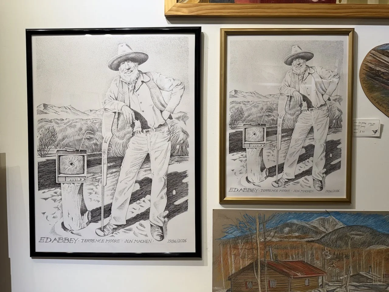 Two framed prints made from a pen-and-ink drawingof the author Edward Abbey, available for sale