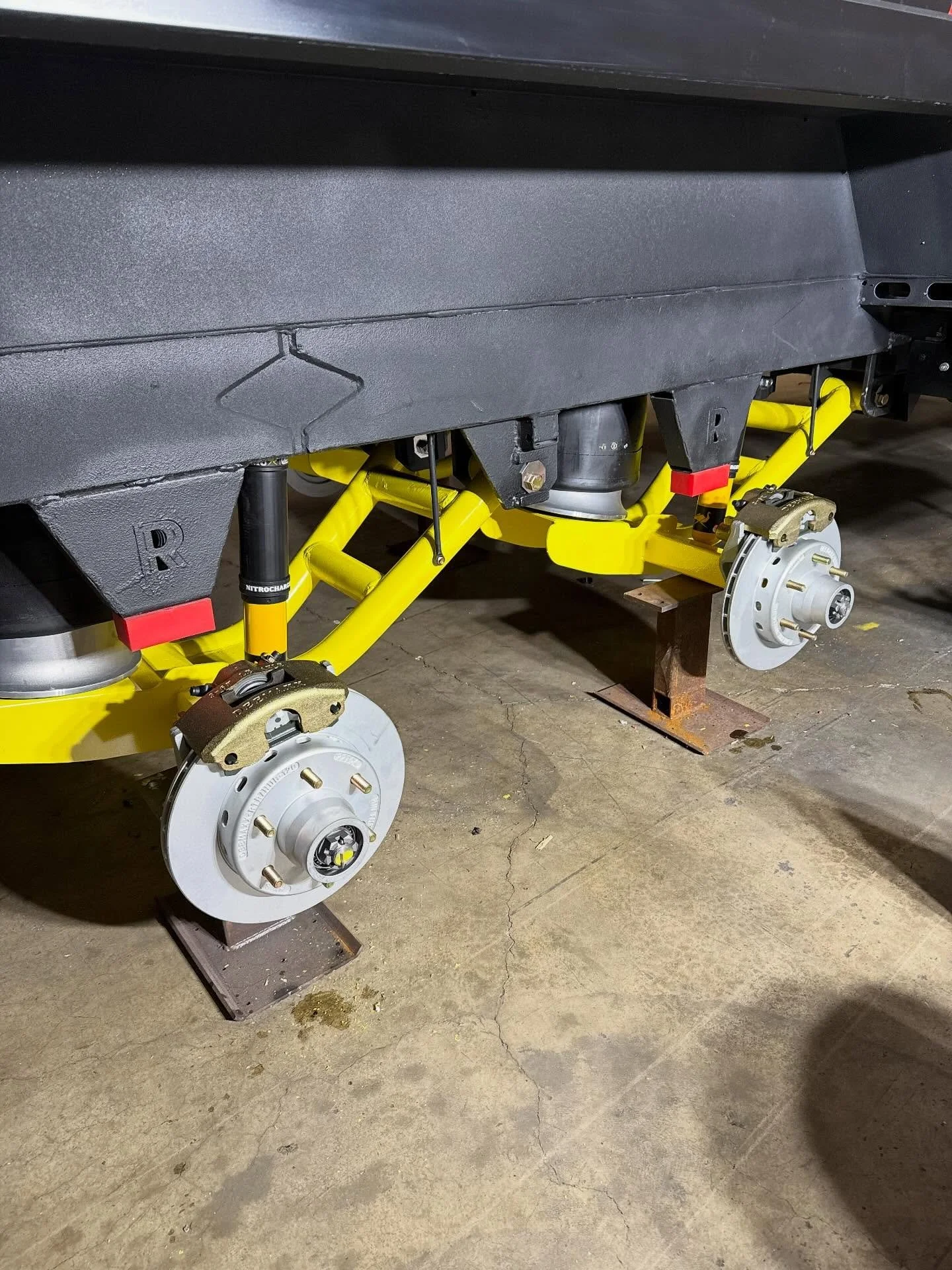 Behind the wheels at RREV &mdash; the HD Independent Suspension install is officially underway!
Fitted with HD air springs, shocks, rotors, and brakes, this setup is built for ultimate stability, strength, and smooth control.

Ready to handle whateve