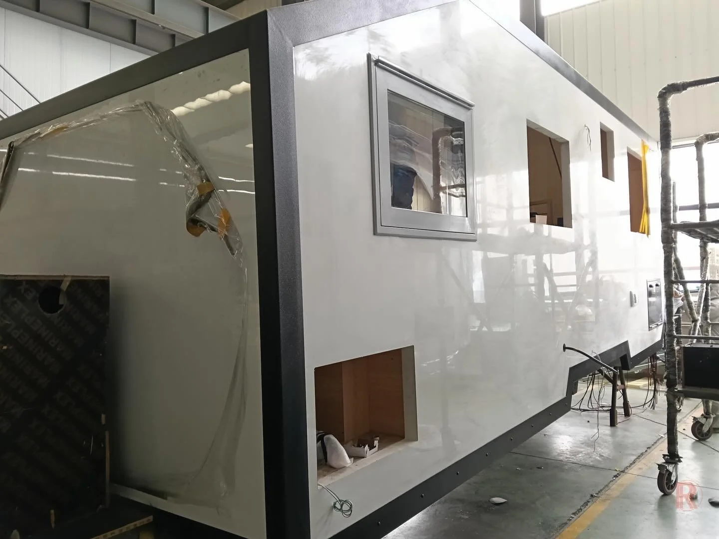 The RREV Titan Edition is designed to feel open, bright, and limitless &mdash; wherever you take it. 

Expansive windows invite natural light to pour in from every angle, transforming the interior into a warm, airy living space that feels larger than