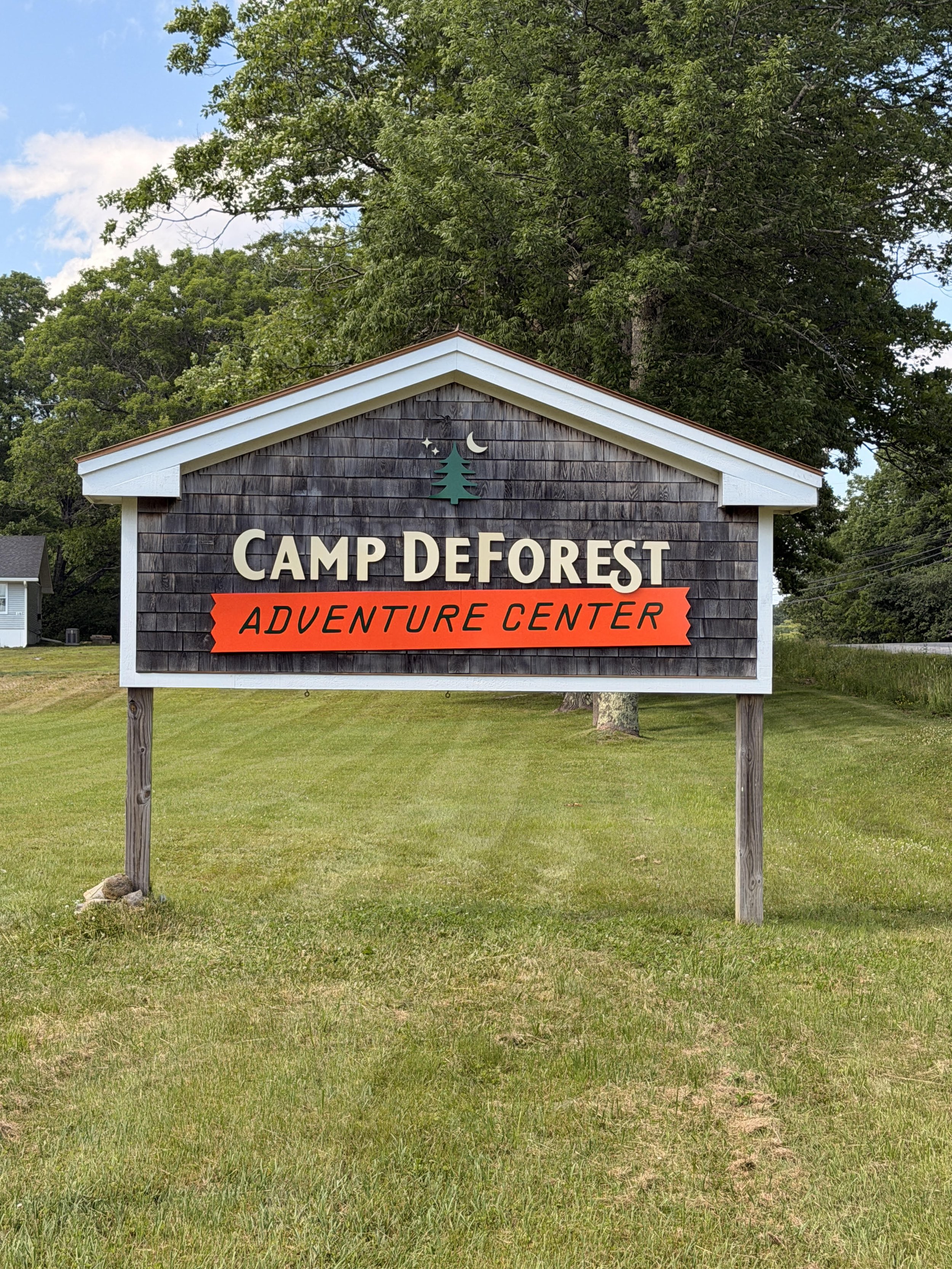 Sign for Camp DeForest Adventure Center in Northport, Maine