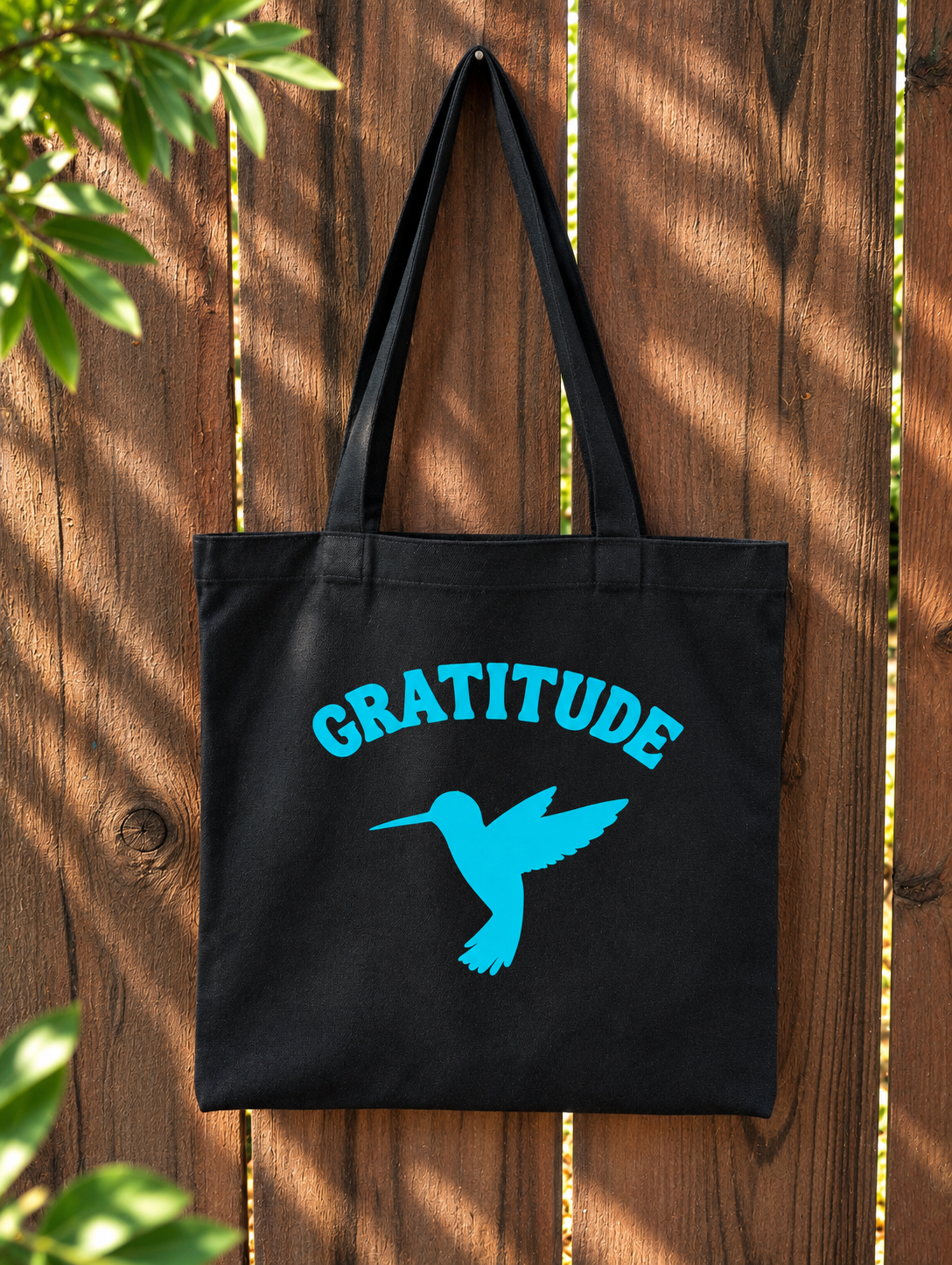 gratitude-hummingbird-teal-tote-black.jpg