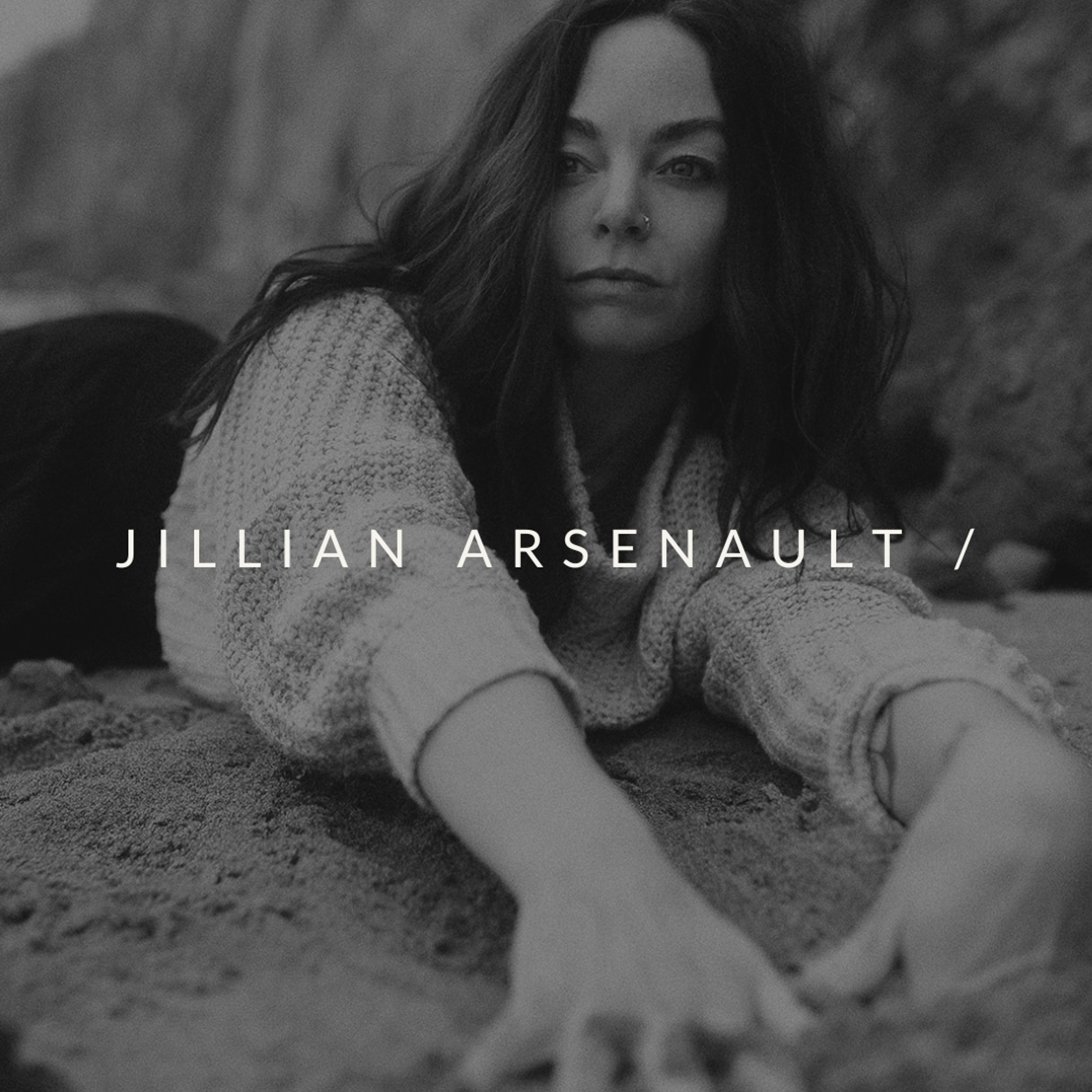 Black and white photo of a woman lying on a beach, reaching her hand toward the camera, with text overlayed that reads 'Jillian Arsenault'.