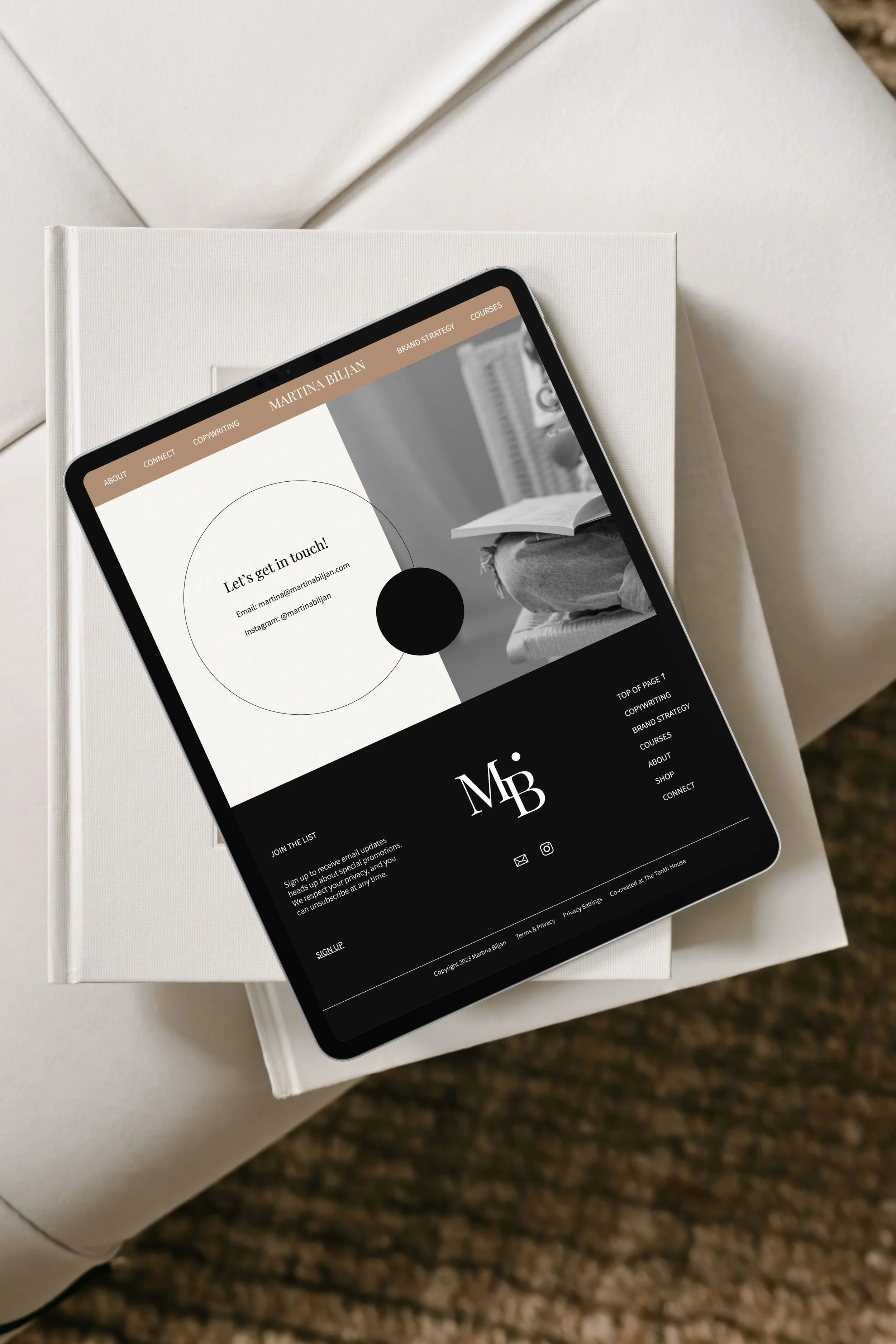 Digital tablet displaying a chic modern website contact page for Martina Biljan.