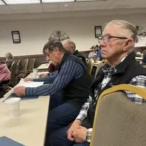 Joe Gibson and Calvin Thomas in the business meeting at the 2024 MACD Convention 