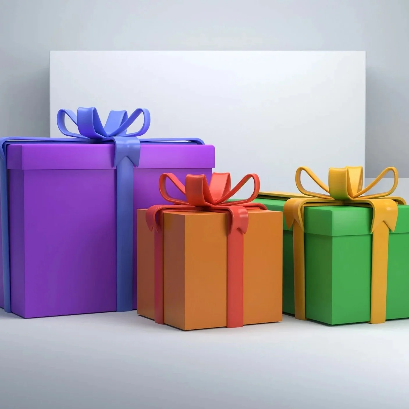Colorful wrapped gift boxes with bows on a white surface and background.