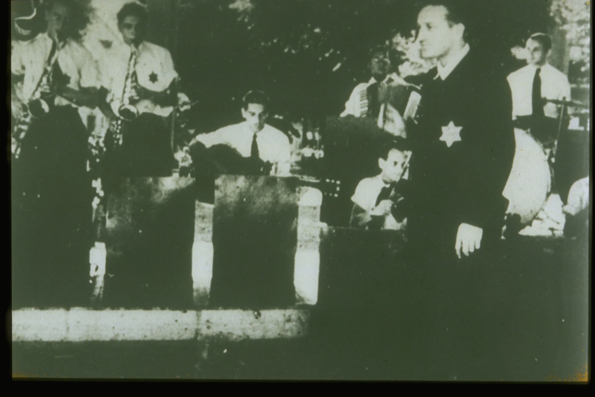Still from the Nazi propaganda film “Theresienstadt, A Documentary Film from the Jewish Settlement Area.” PT #1869. Shown here are The Ghetto Swingers performing with band leader Martin Roman.