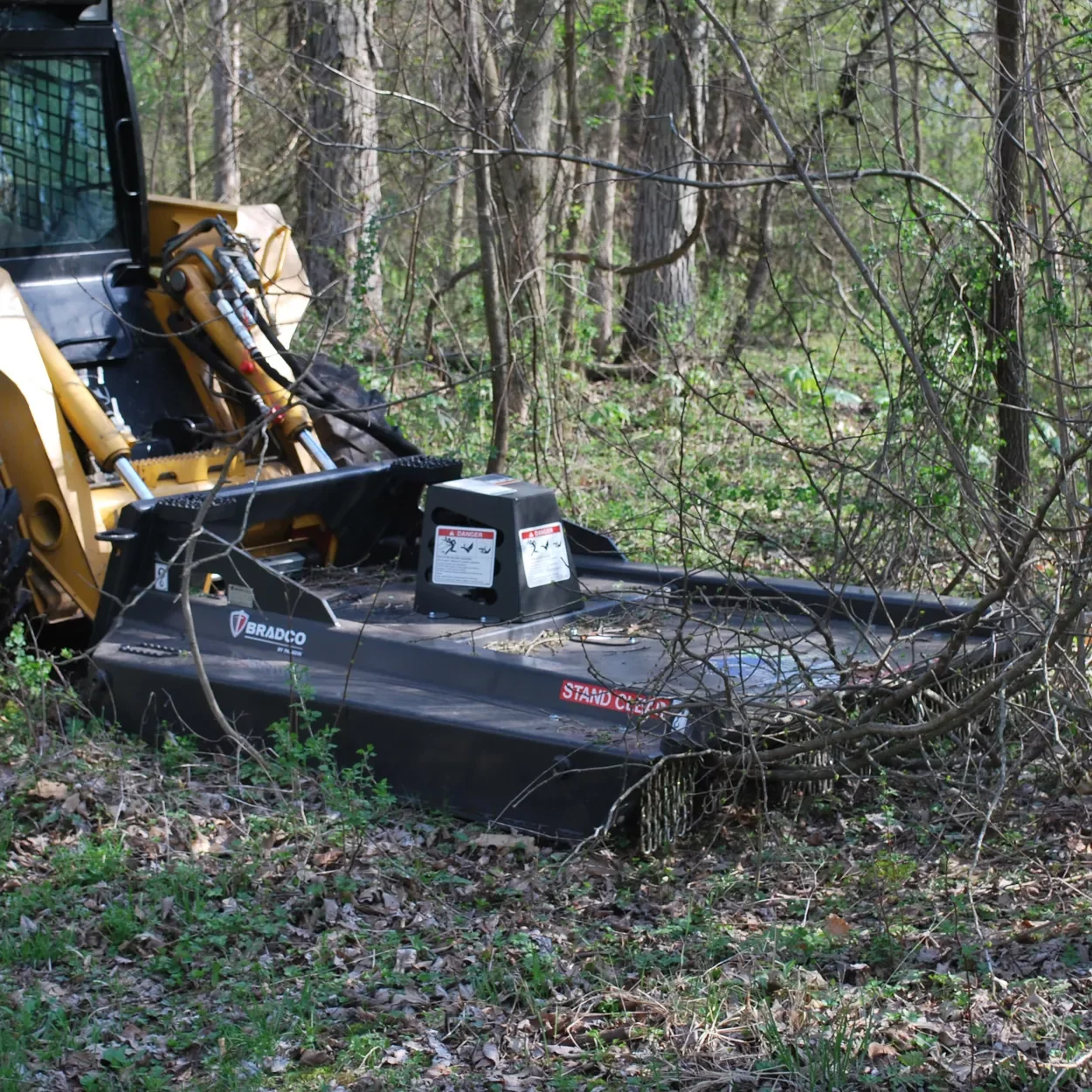 Brush cutting services.