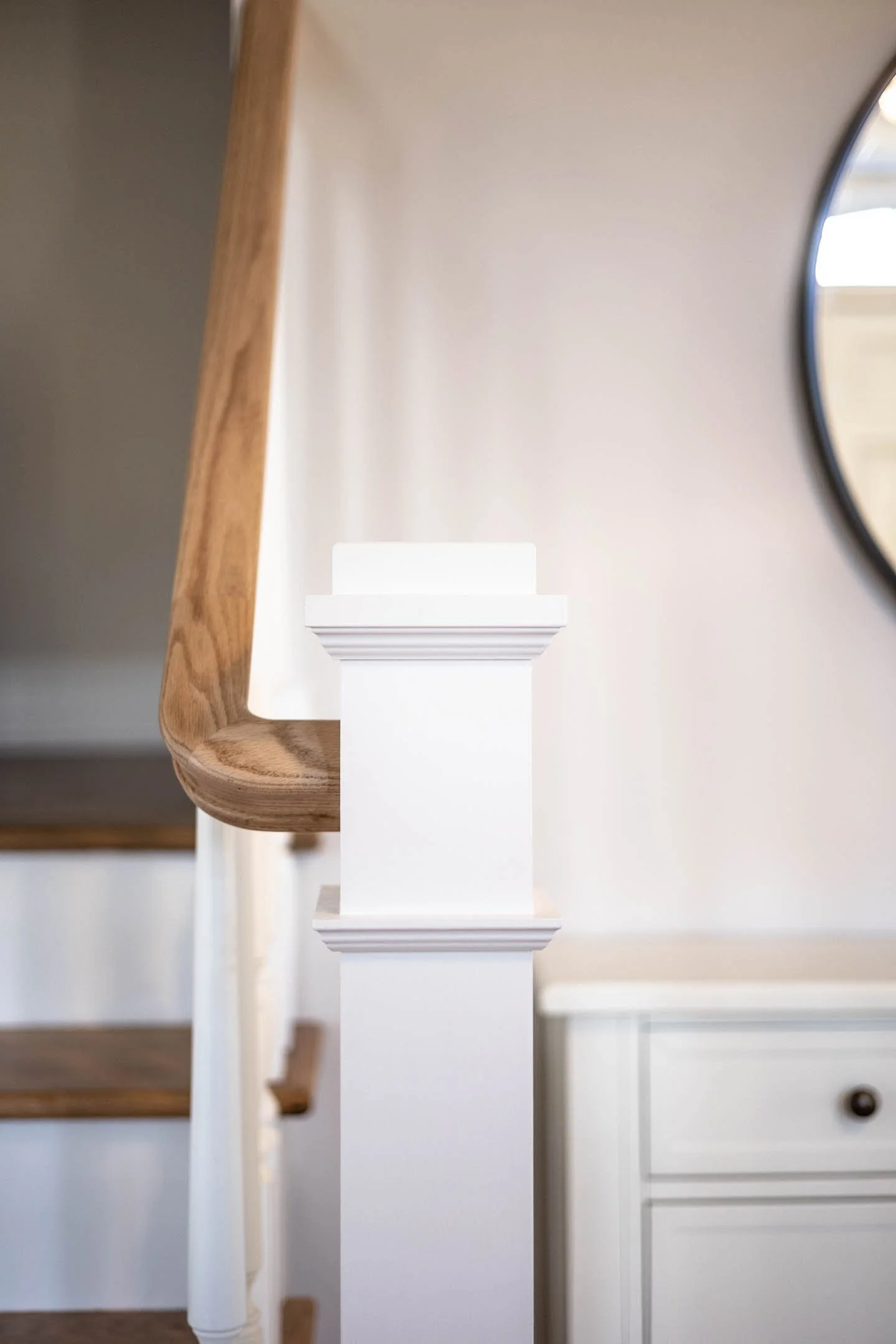 Handrail banister, post, and wooden spindles installed by Alpine Flooring a flooring company in Somerville, New Jersey. Alpine Flooring specializes in hardwood flooring install, refinishing, handrails, luxury vinyl plank flooring, carpet.