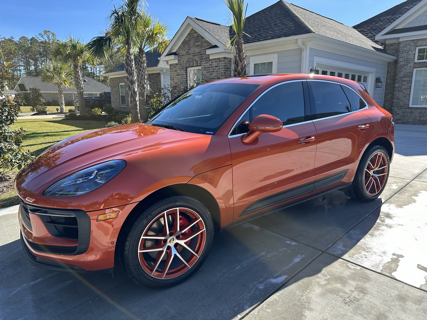 Orange 2024 Porsche Macan Side View