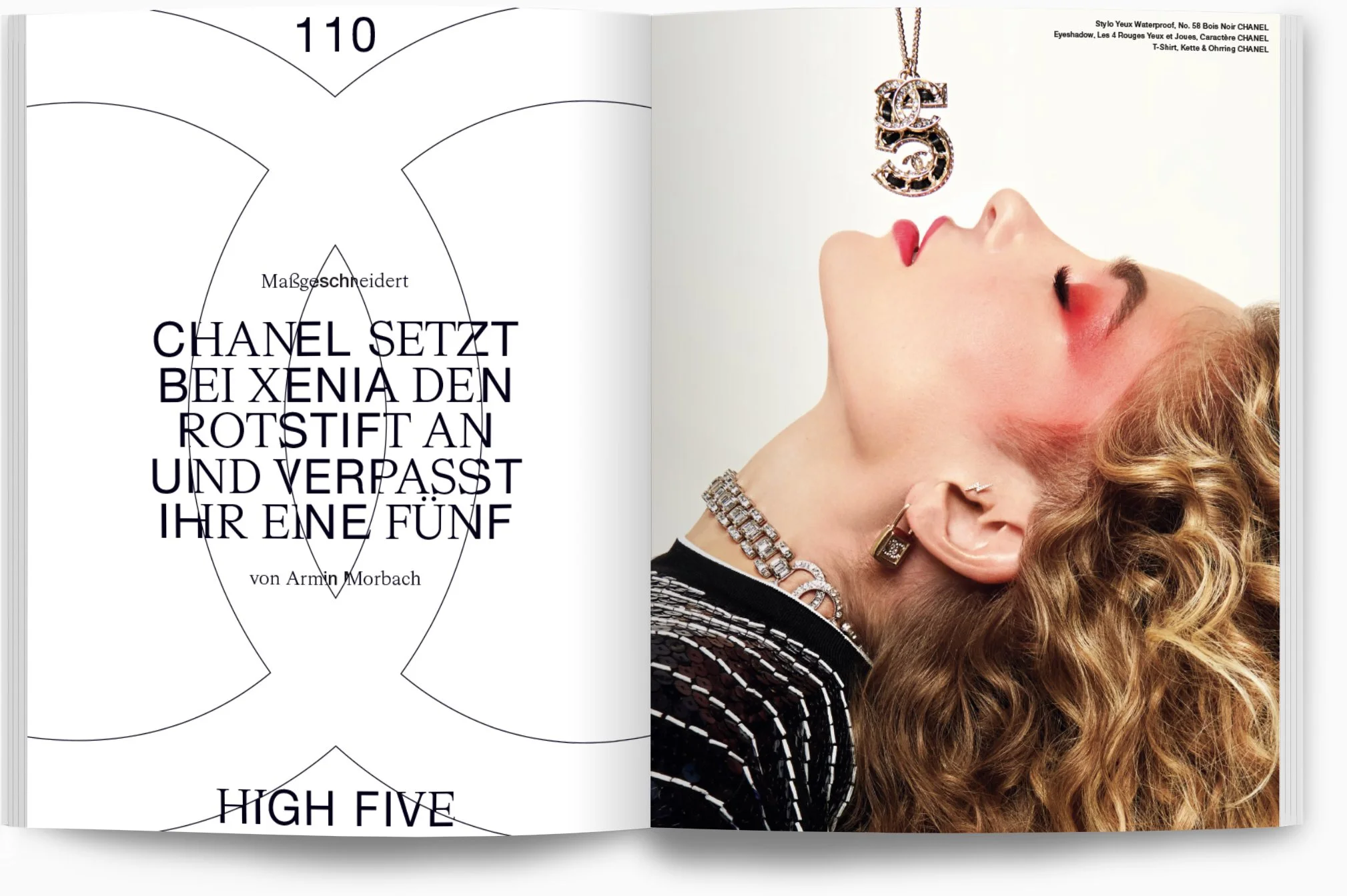 Anzeige für CHANEL Schmuck und Kosmetik, mit einer Frau, die teuren Schmuck trägt, und einem CHANEL-Logo-Halskettensymbol über ihrem Gesicht.