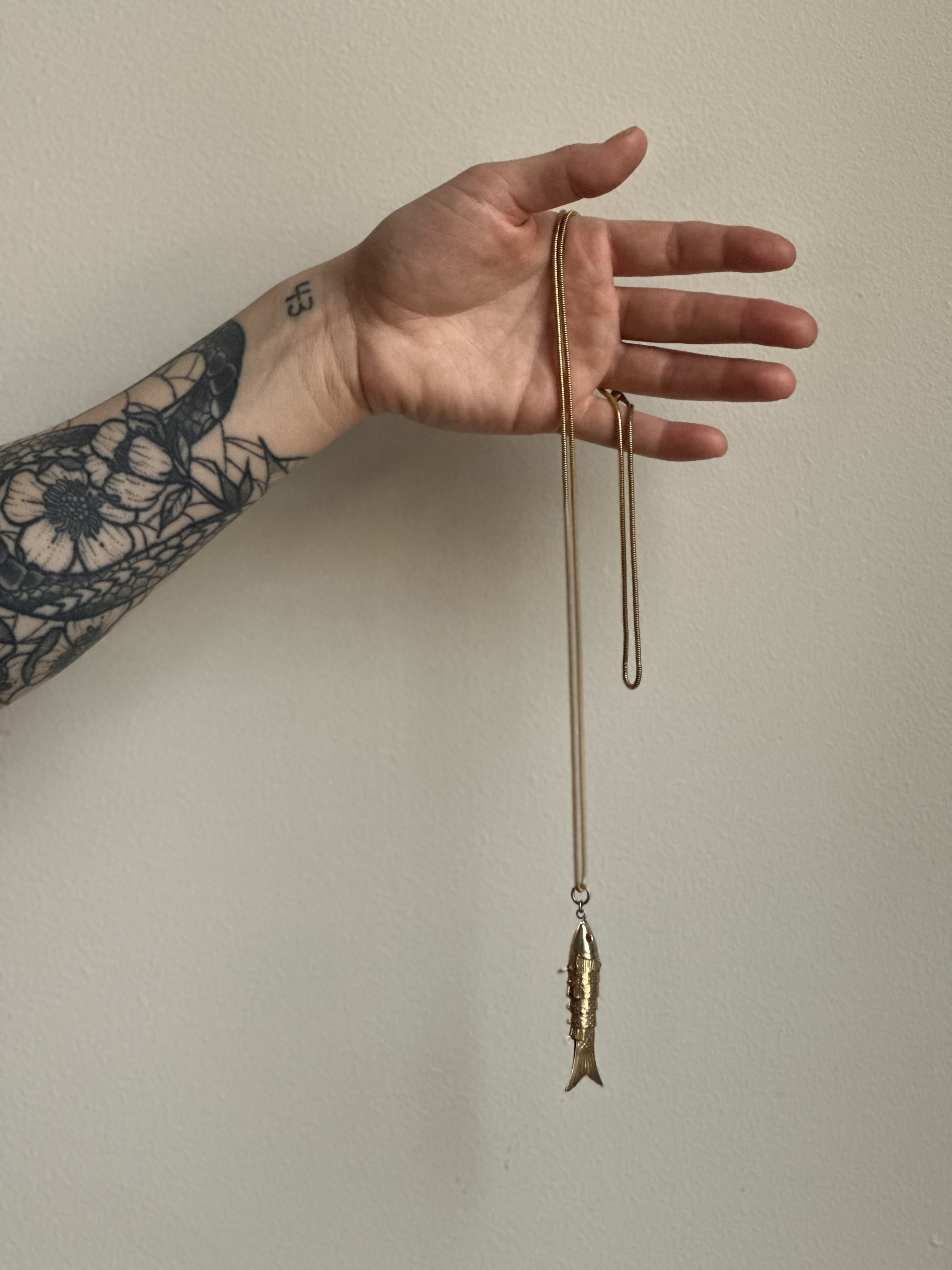 MCM fish necklace