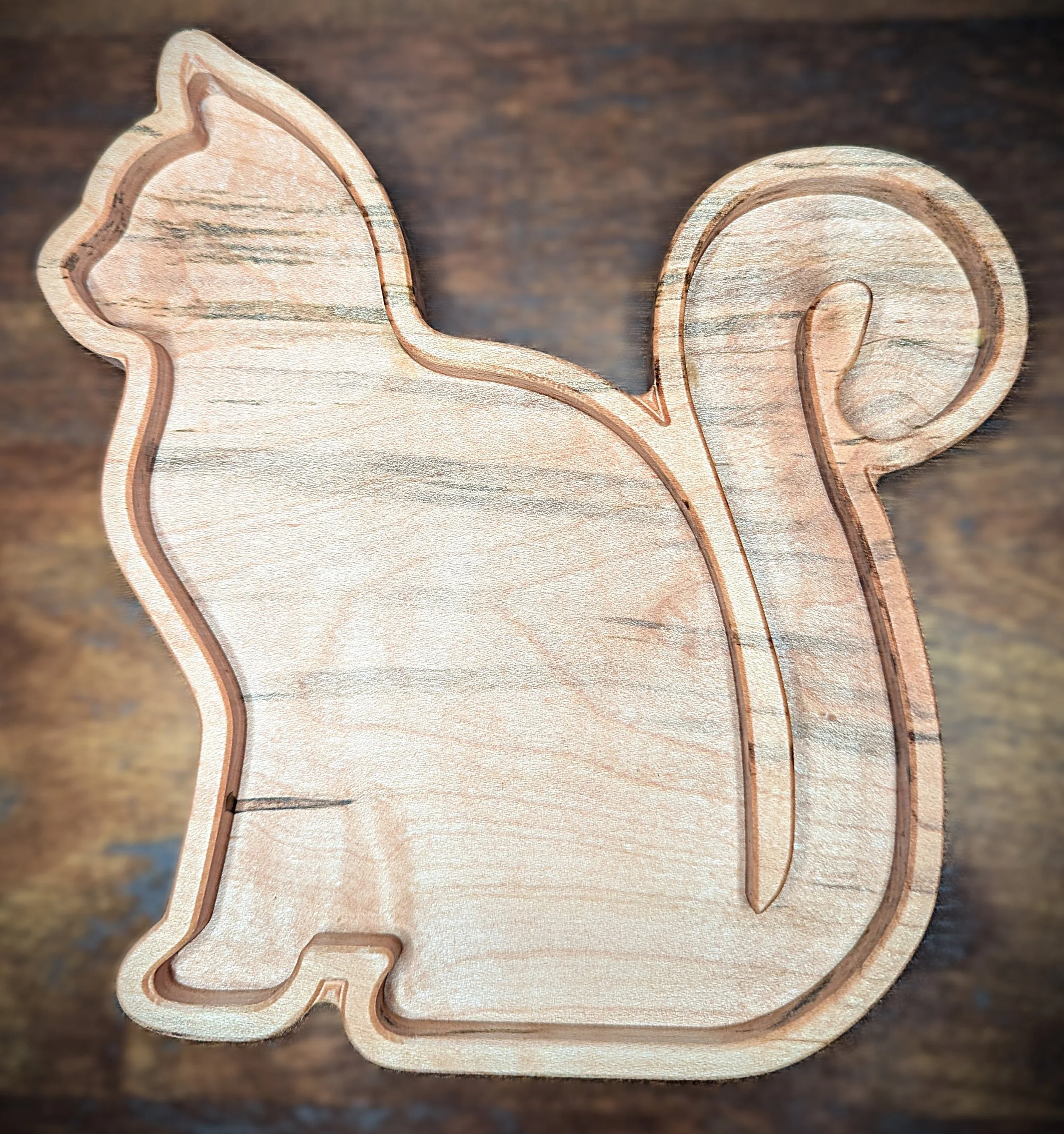 Cat Catchall Tray in the shape of a cat crafted from premium Appalachian curly maple wood in Asheville, NC. Perfect for jewelry tray, coin dish, keys, tobacco, or other small items.