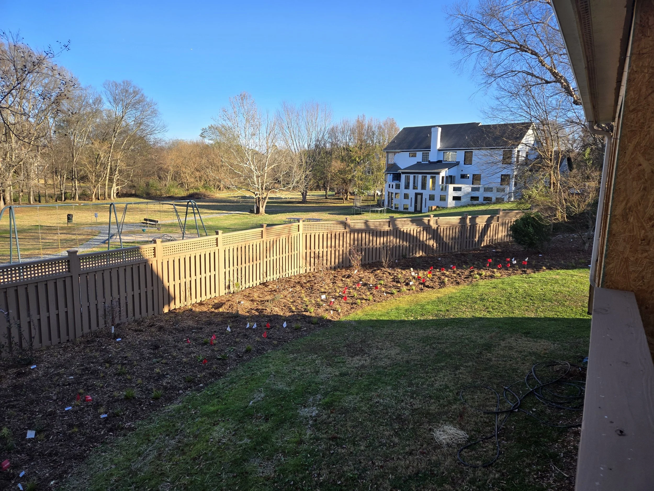 After - back border as seen from the under construction new sunroom