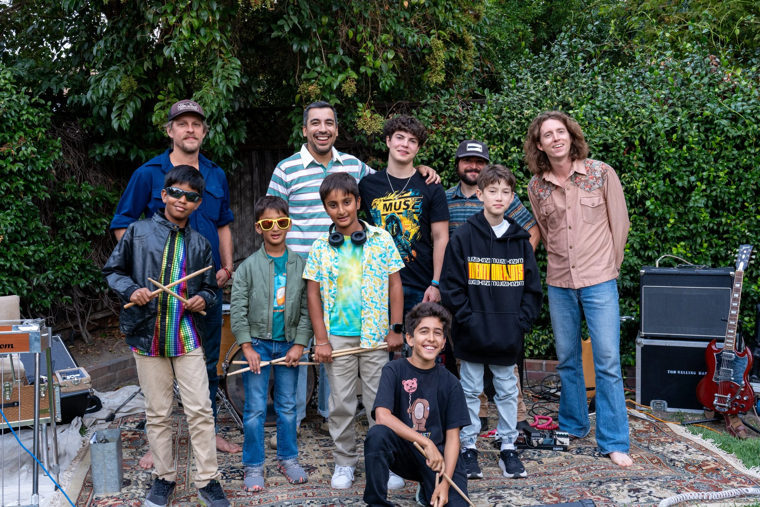 Alex with his students and band 2024