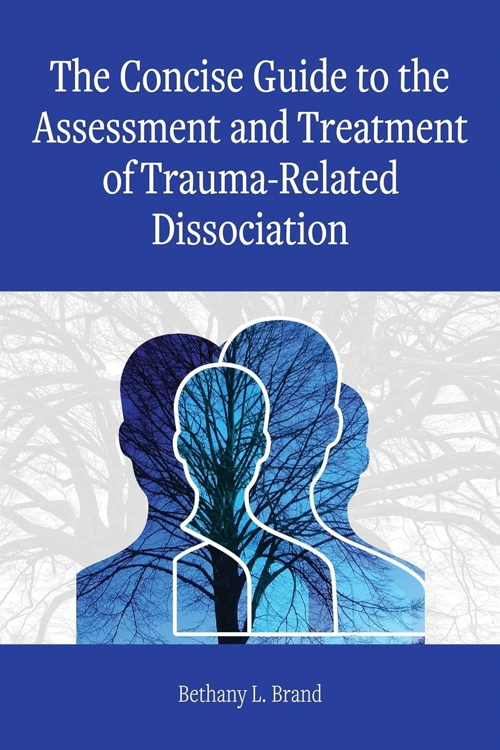 Book cover titled 'The Concise Guide to the Assessment and Treatment of Trauma-Related Dissociation' by Bethany L. Brand, featuring silhouettes of three human heads with their profiles overlapping, filled with a tree branch pattern, on a background with light tree branches.