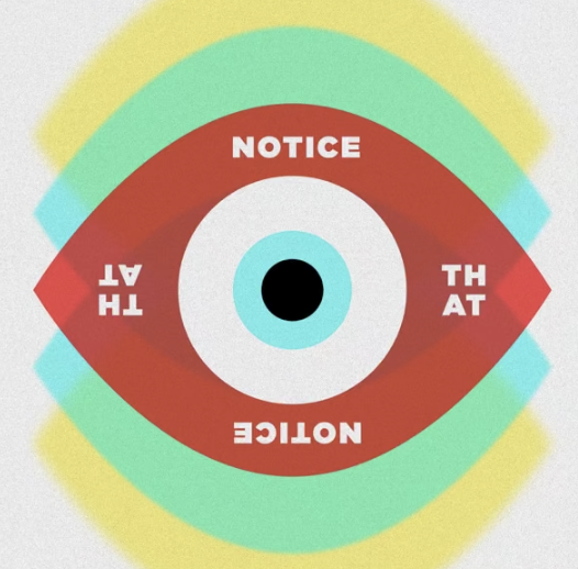A colorful eye illustration with concentric circles and the words 'NOTICE,' 'THAT,' and 'ATTENTION' around the iris.