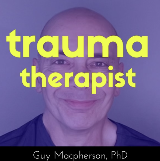 Book cover featuring a smiling man with a shaved head, with the title 'Trauma Therapist' in large yellow letters and the author's name, Guy Macpherson, PhD, at the bottom.