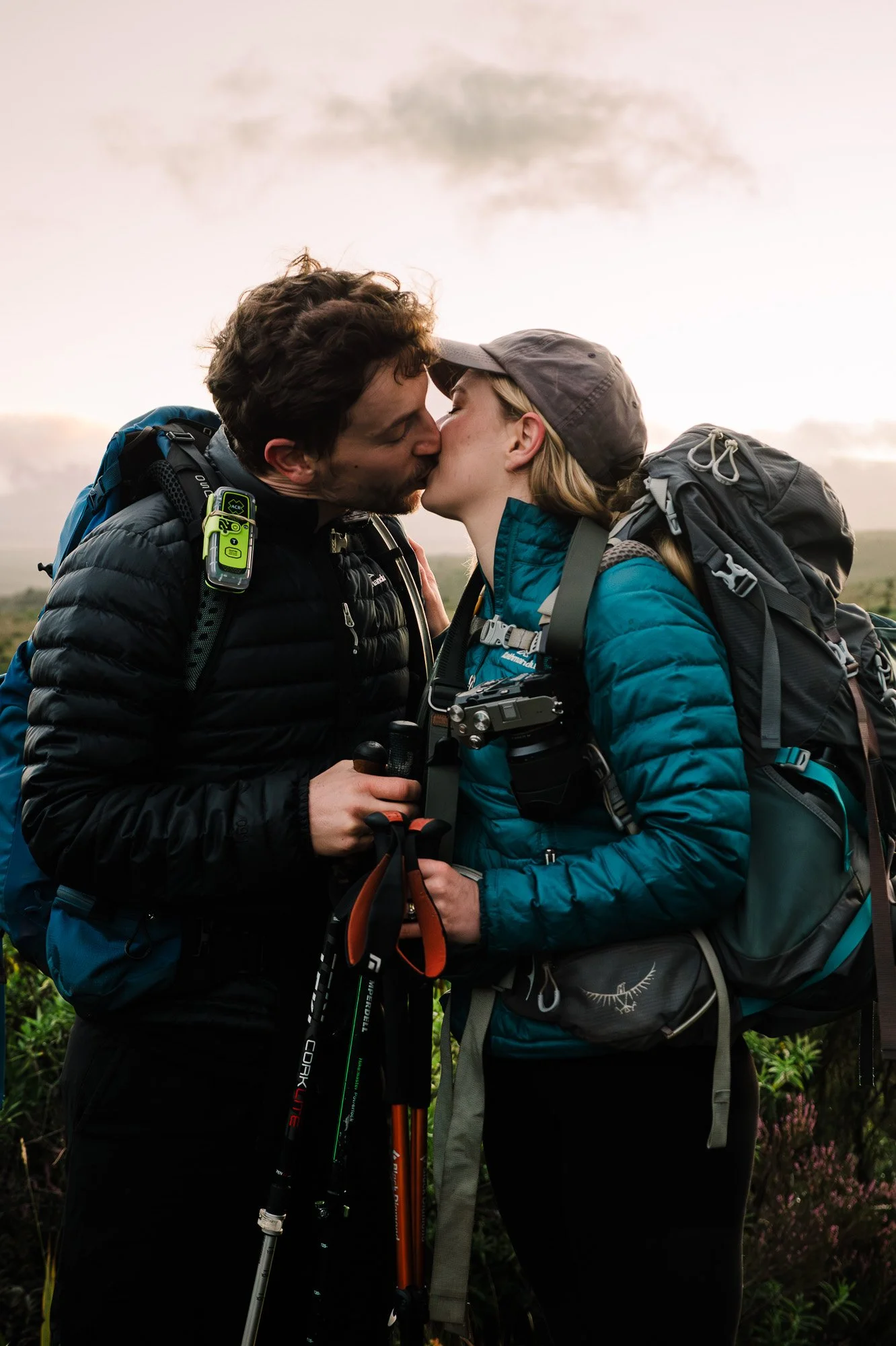 Couple kissing on Mounds Walk in Tongariro National Park during a New Zealand couples photography session by Kevin M Films.