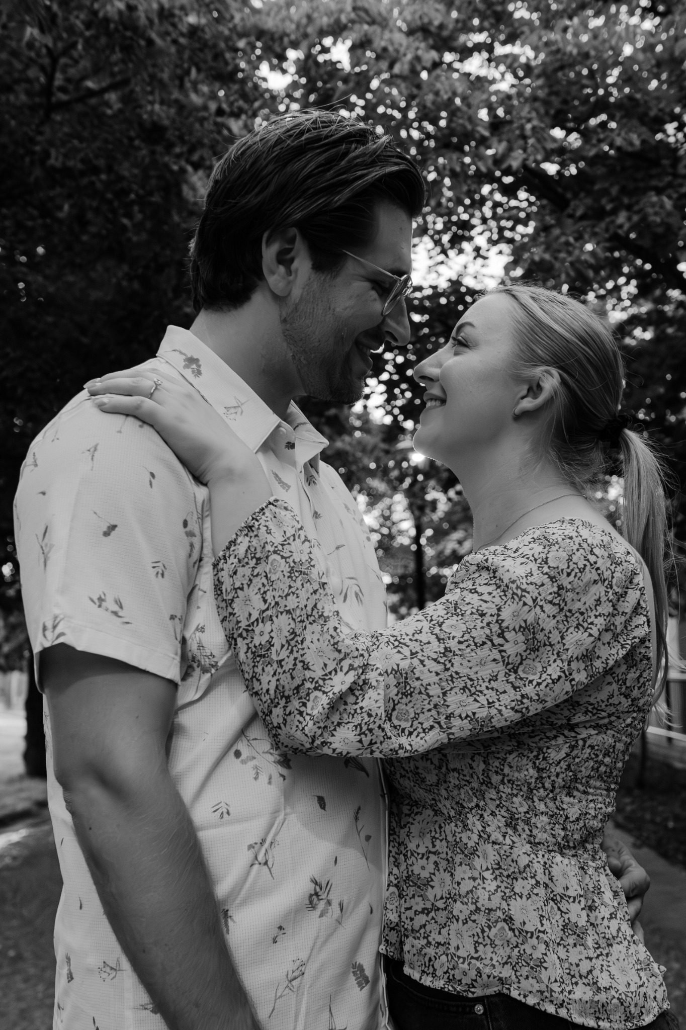 Black-and-white couple portrait in downtown Medicine Hat during an Alberta couples photography session by Kevin M Films.