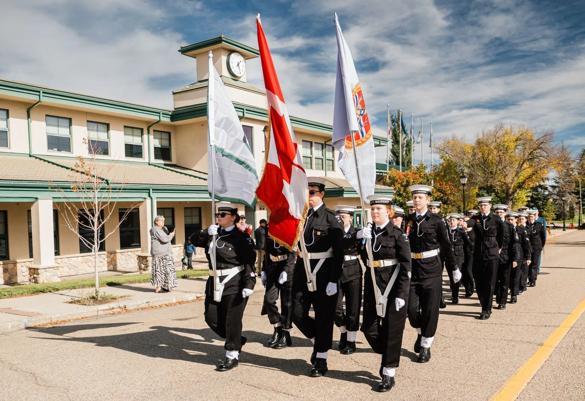 Sea cadets march with flags through downtown Stony Plain during the Freedom of the Town ceremony.
