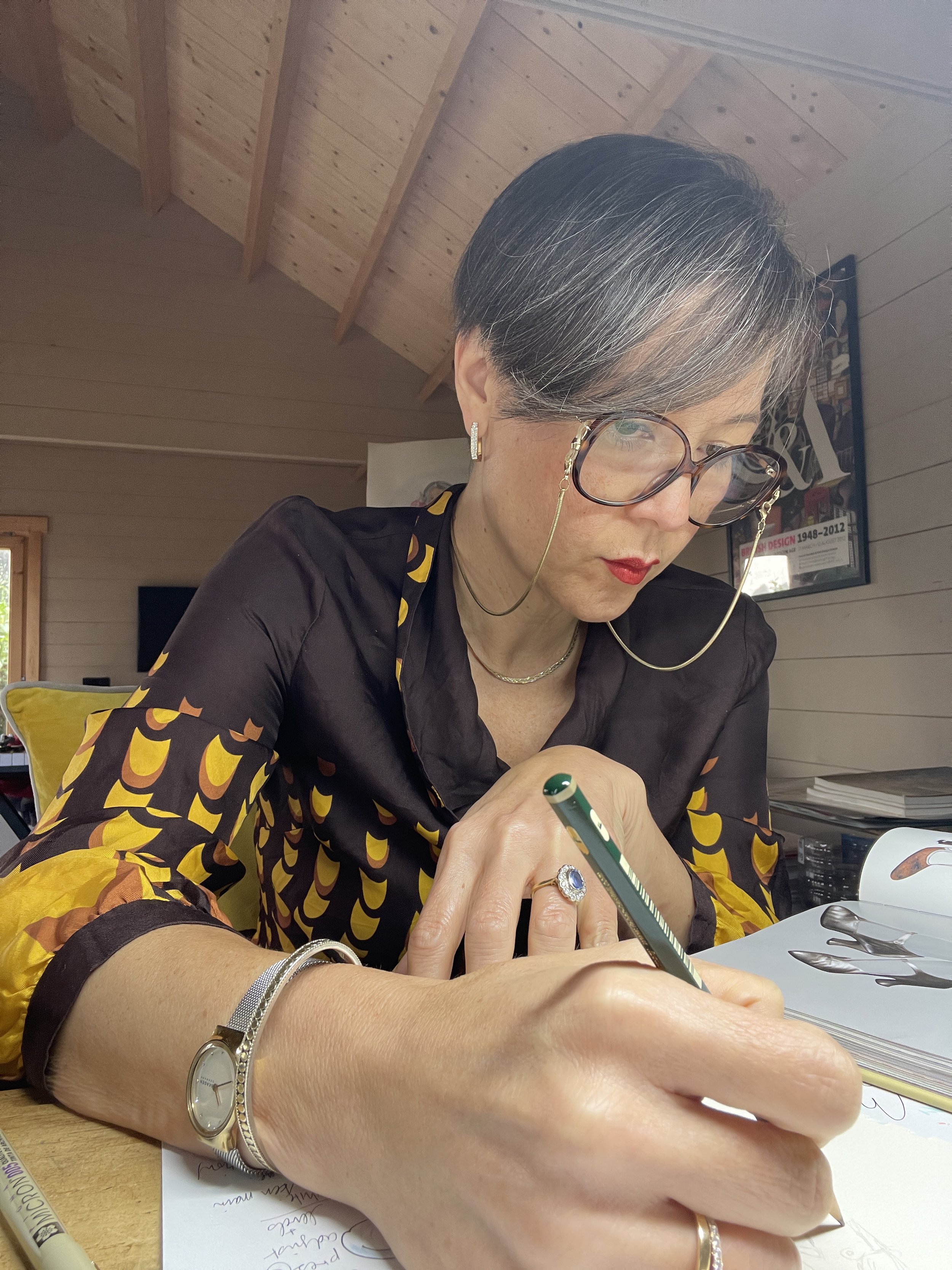 Kathy Kyle drawing in her studio