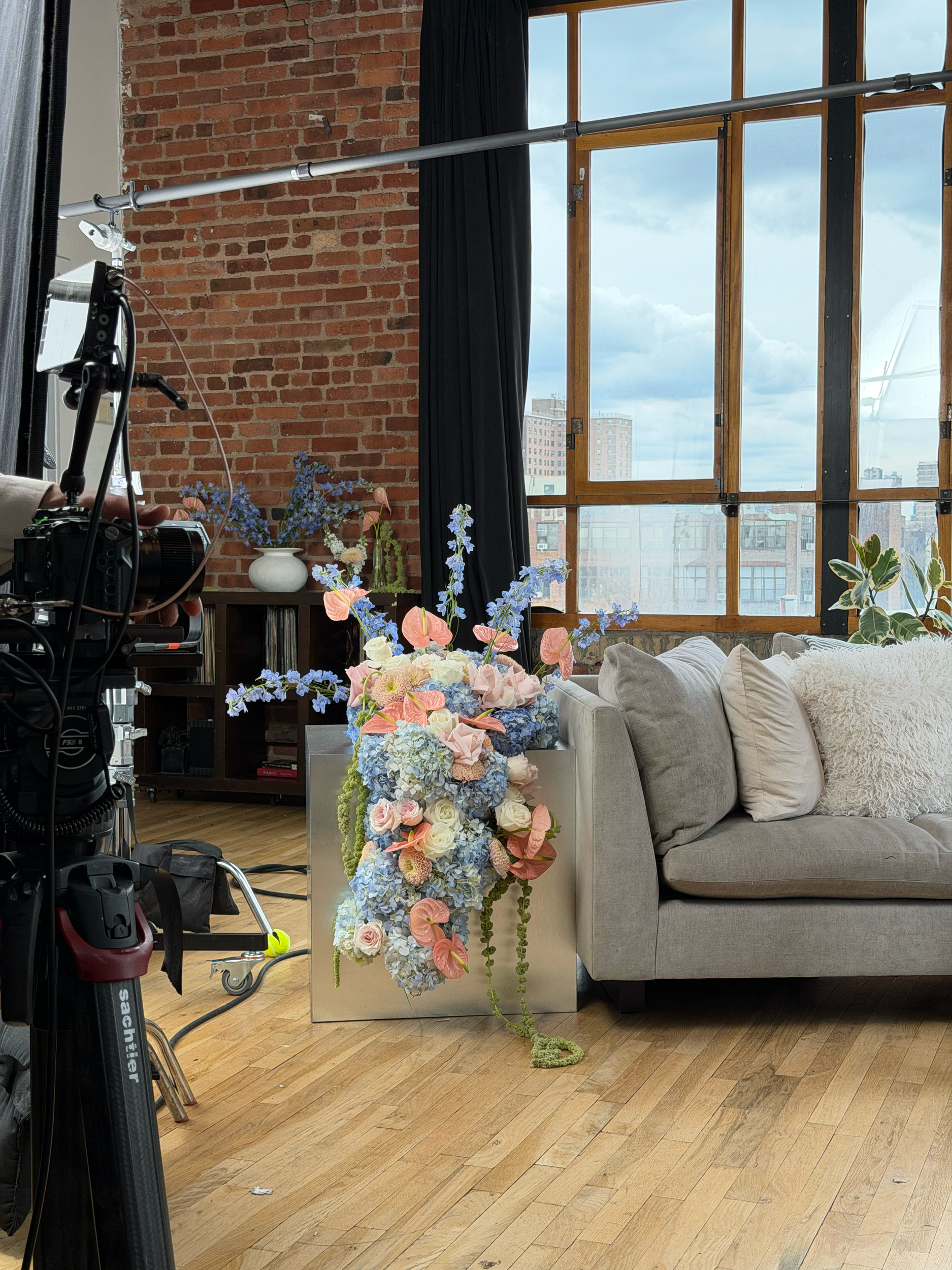 Cascading floral arrangement on set