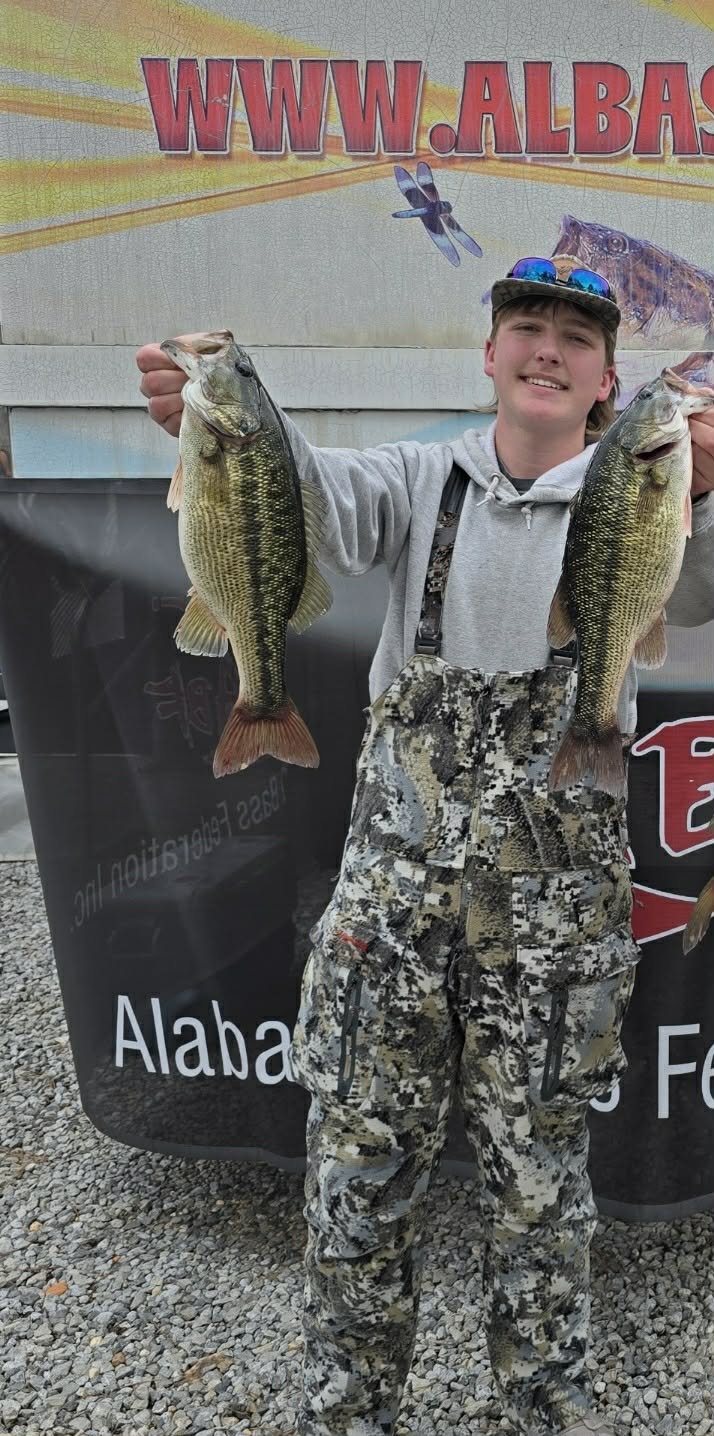 BWCJ high school angler Max Plemmons showing off a couple nice bass after his tourney on Lake Mitchell 2-14-26.