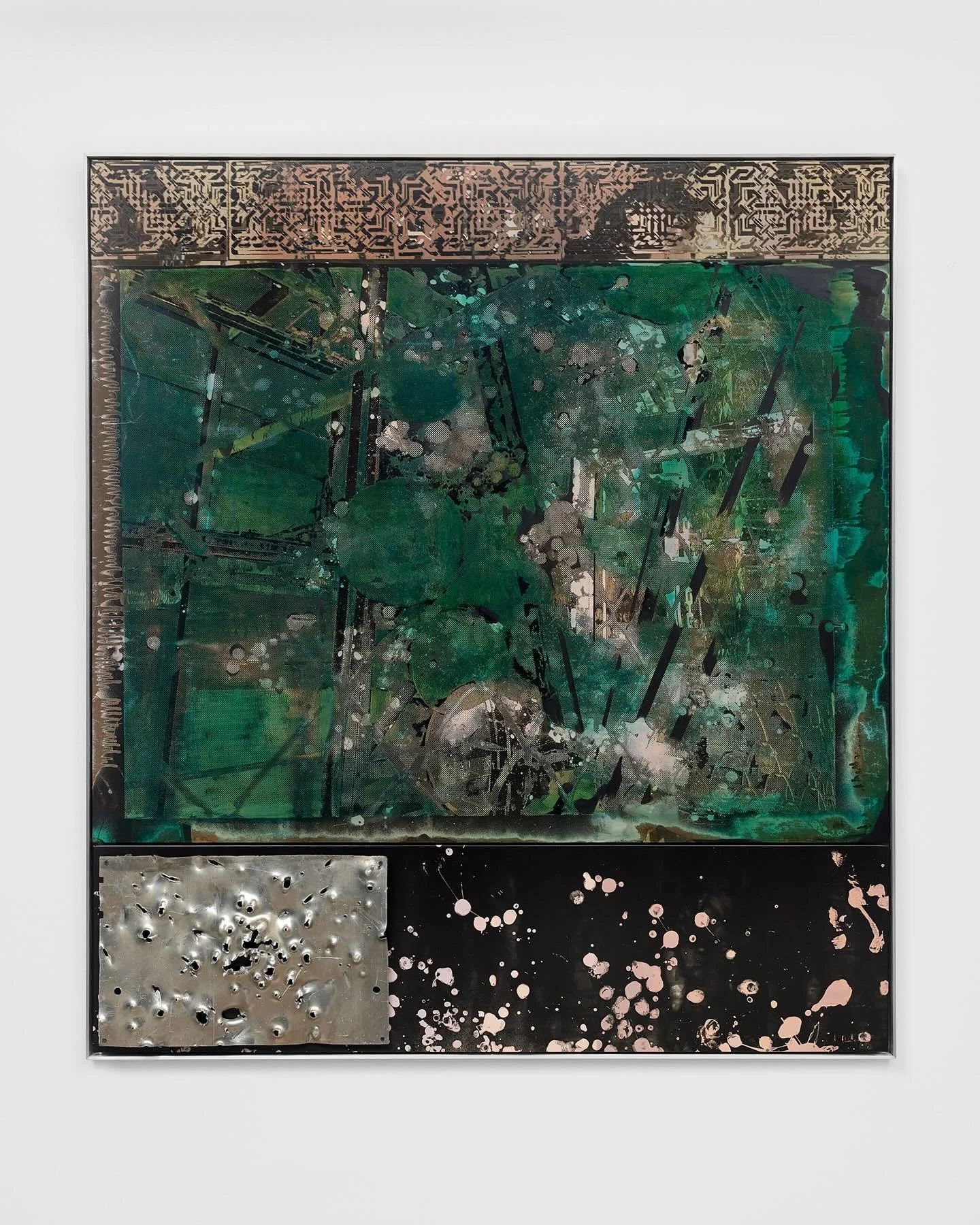 A 2-D work mounted to a white wall features splatters and brushtrokes of white and green in addition to a bullet hole-ridden metal rectangle on the bottom left and a band of geometric ornamentation on the top of the work.