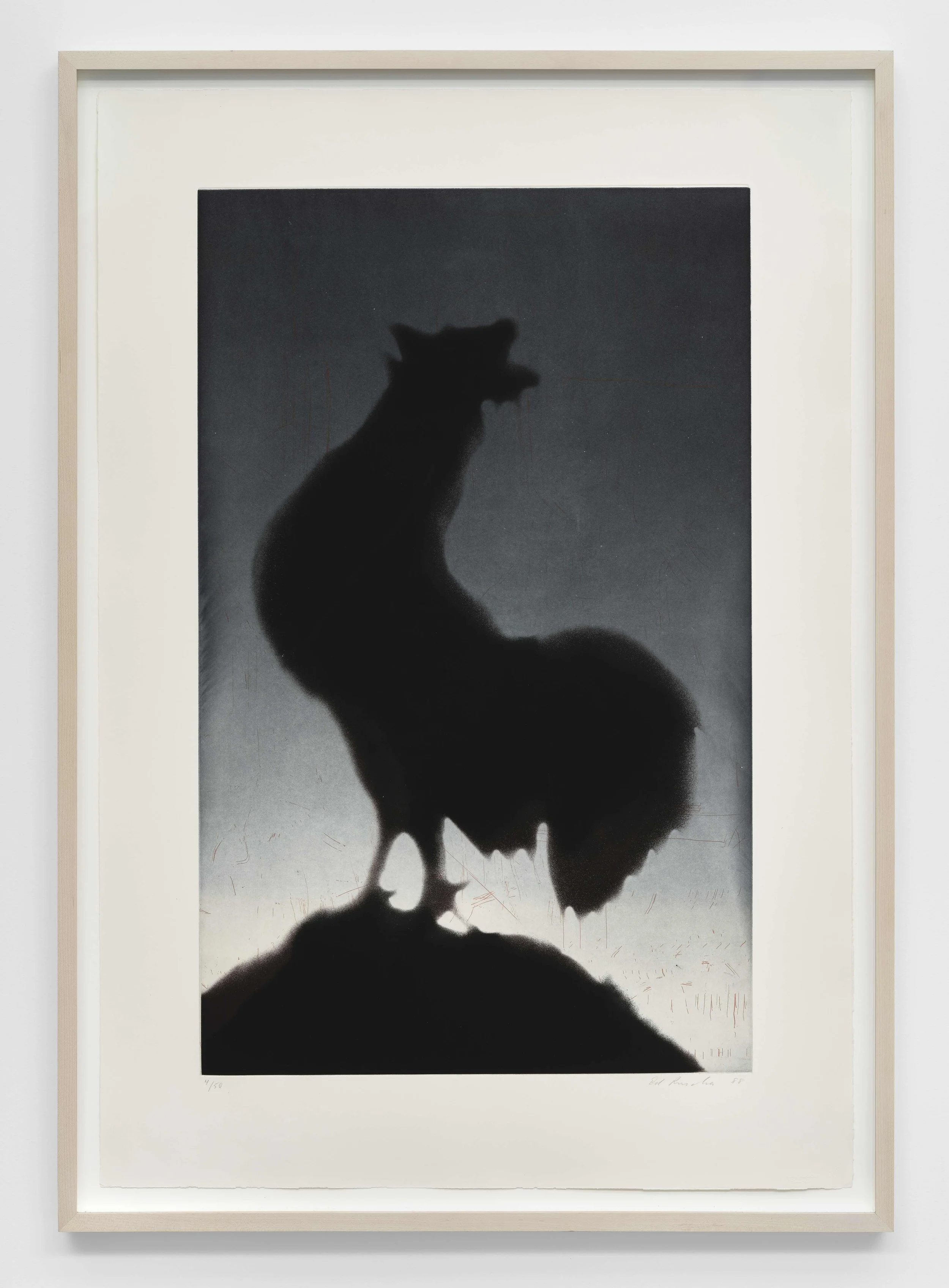 A print of a crowing rooster features the animal's silhouette in black against a dawn skyline in a gradient of navy to white.