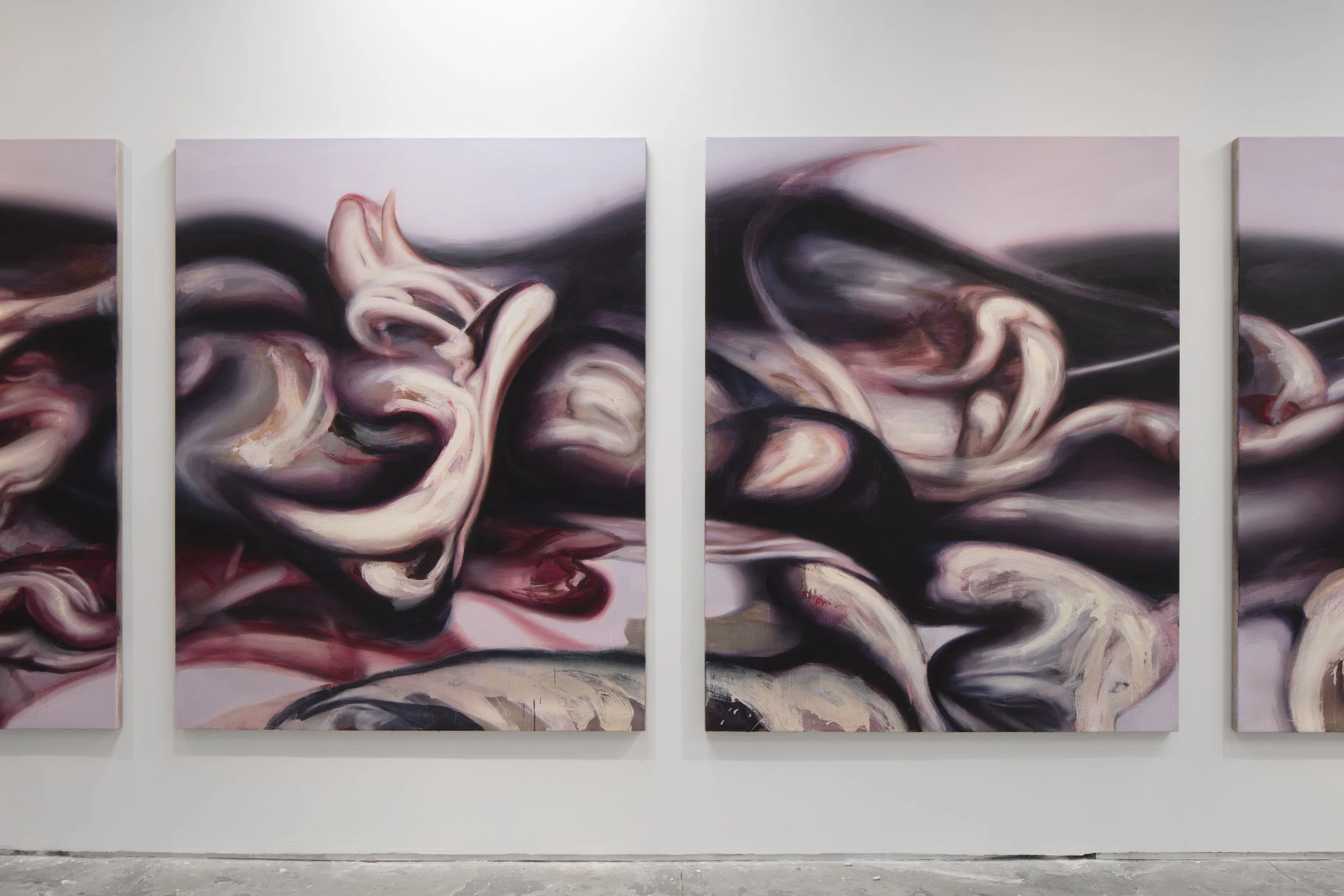 Three abstract paintings with fleshy, swirling forms in pink, mauve, and black tones mounted on a white gallery wall.