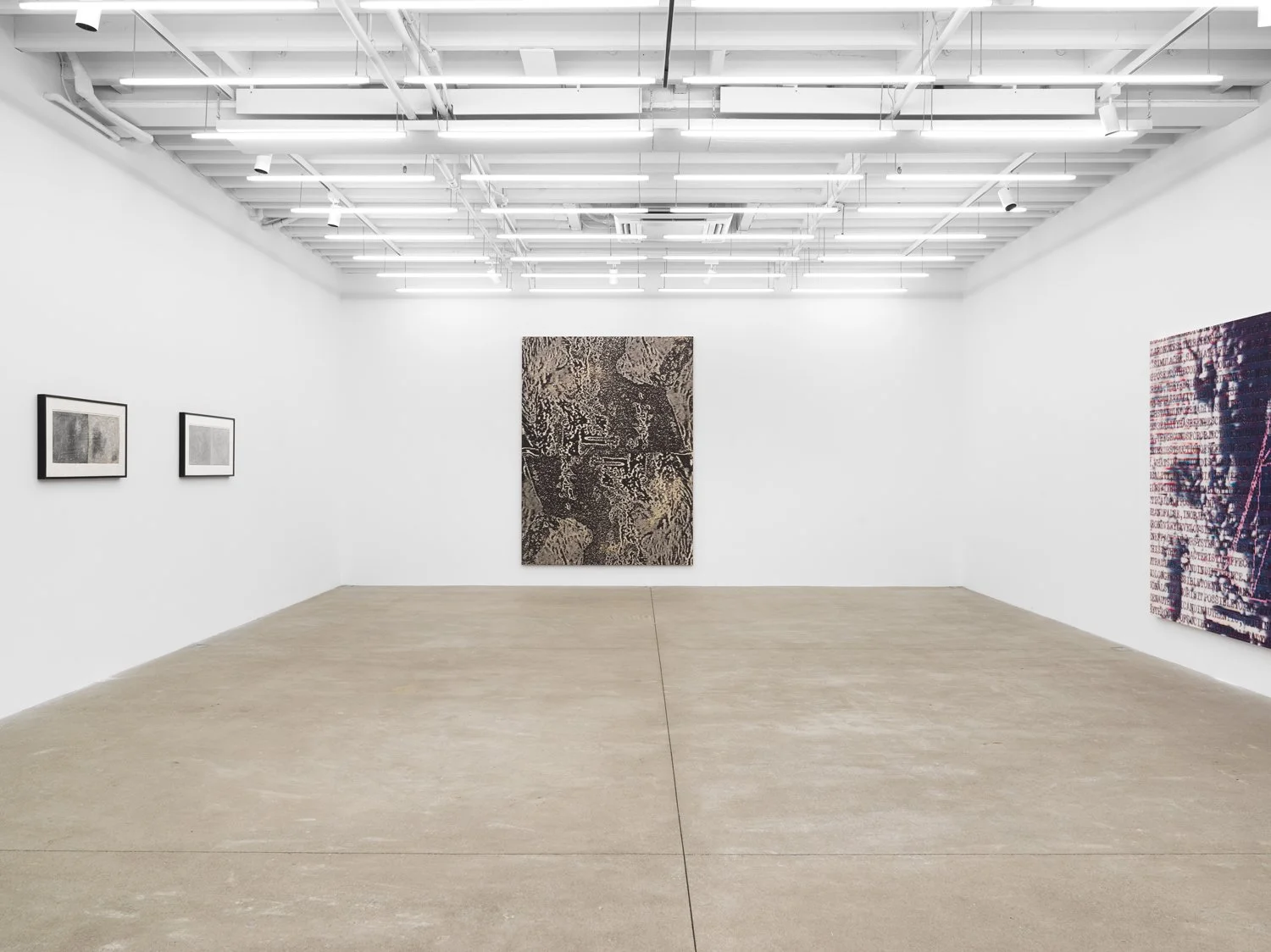 A large, white gallery room features two large paintings and a pair of smaller graphite drawings. The large paintings appear glitchy and pixellated, with monochromatic brownish and purple palettes.