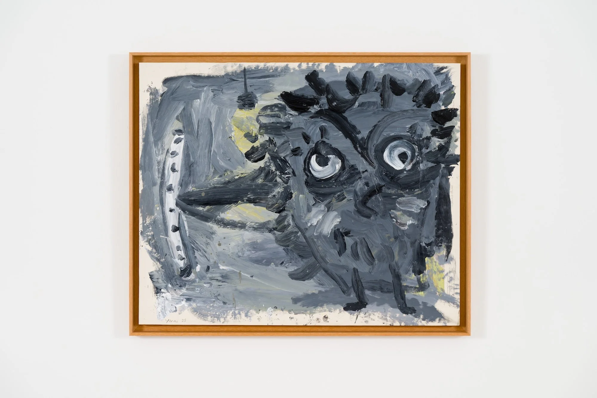 Horizontal monochrome painting in gray tones depicting an abstracted owl-like figure with exaggerated eyes, framed in light wood.