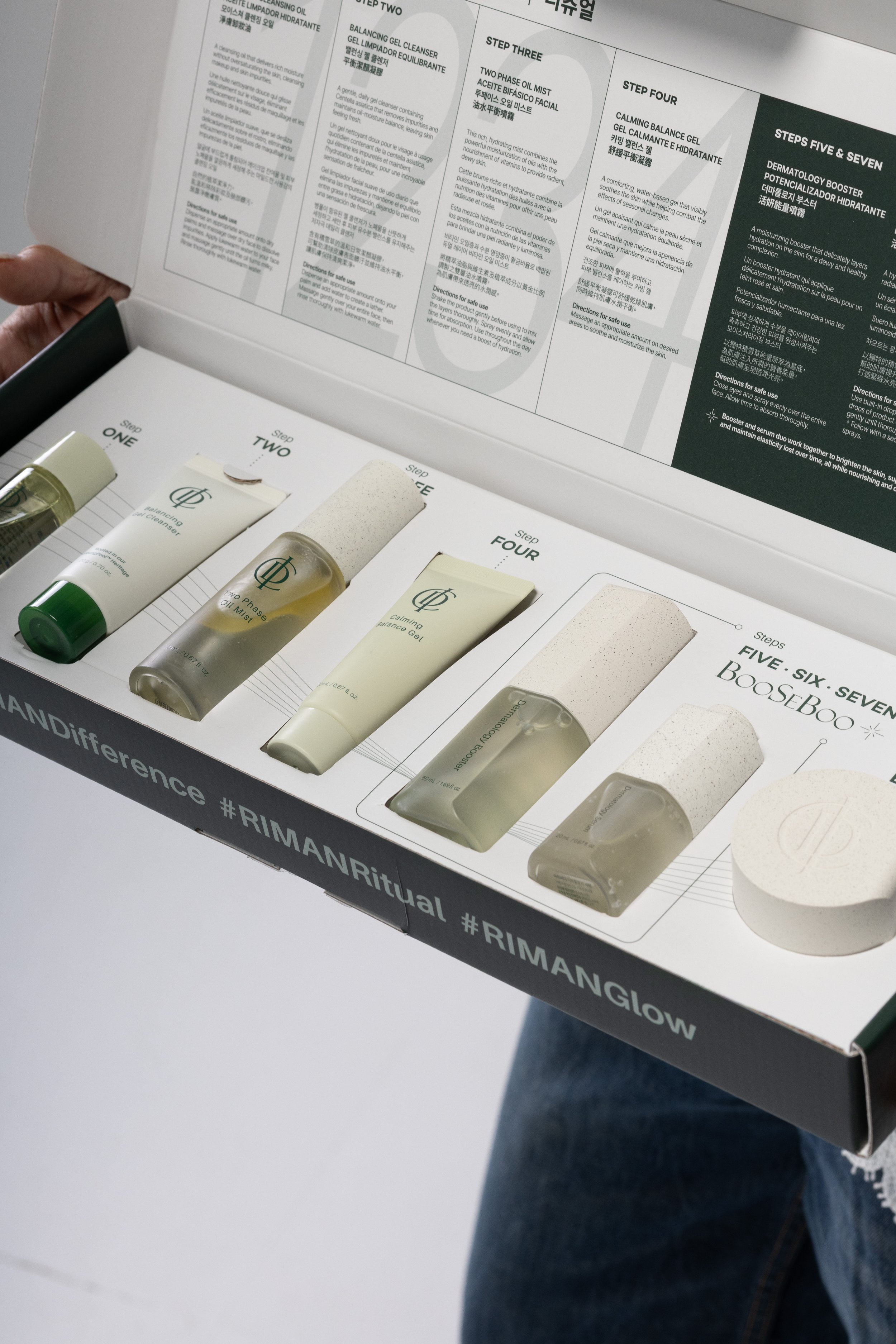 Seven-step Korean skincare routine included in the ICD Experience Kit featuring cleanser, booster, serum, oil mist, calming gel, and cream.
