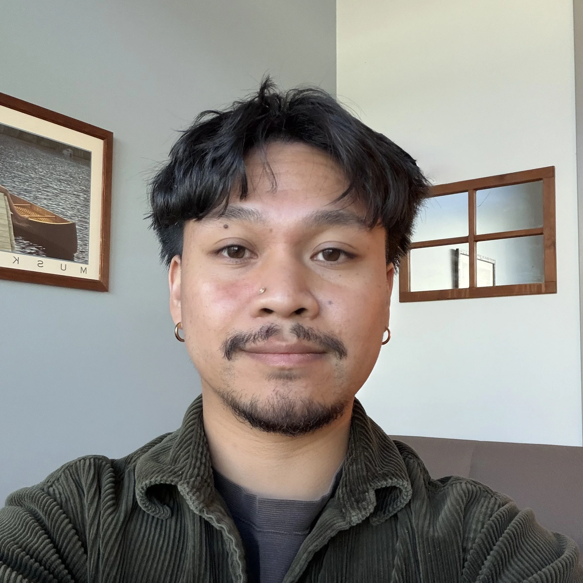 Meet Kurt, a Filipino-Canadian male Psychotherapist offering calm, trauma-informed therapy for adults navigating anxiety, identity, and relational challenges in Ontario.