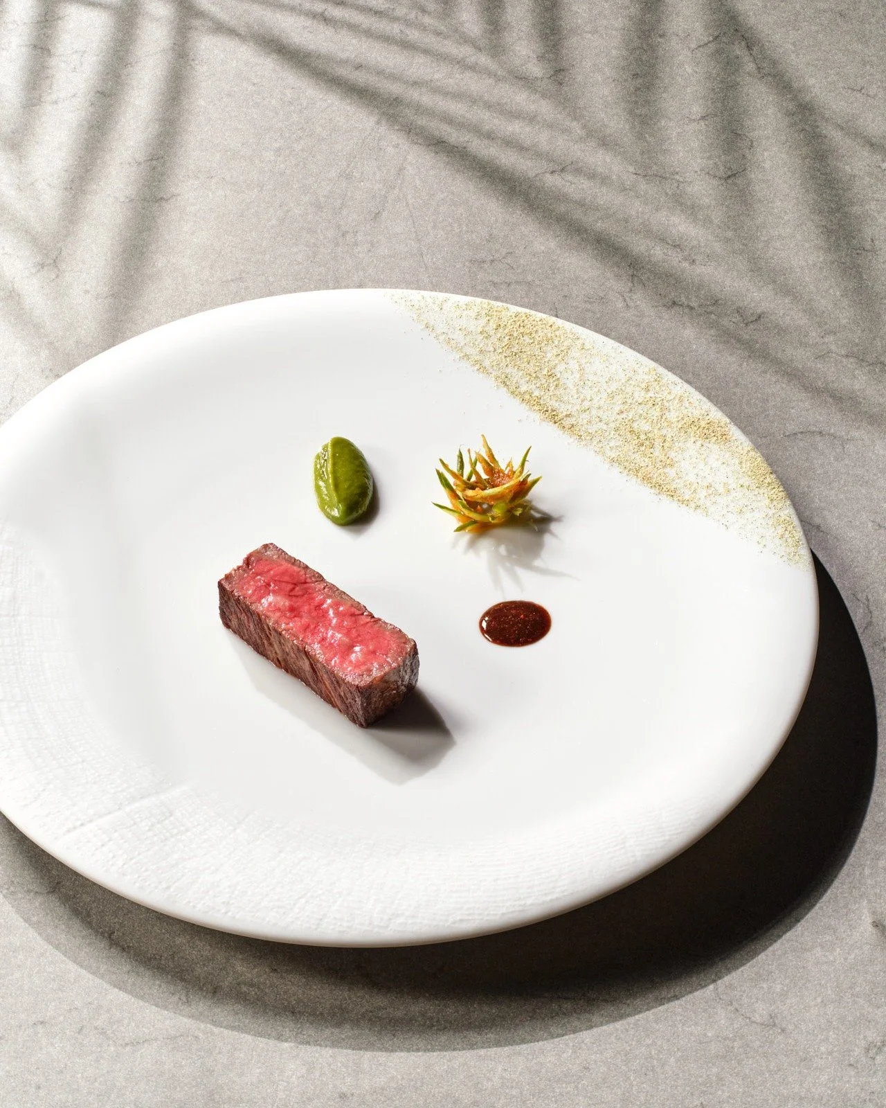 Four expressions, one intention: to surprise the palate

At once familiar and unexpected, this dinner dish pairs perfectly marbled Tajima Wagyu with four playful interpretations of garlic. Tender, balanced, and boldly nuanced&mdash;a composition that