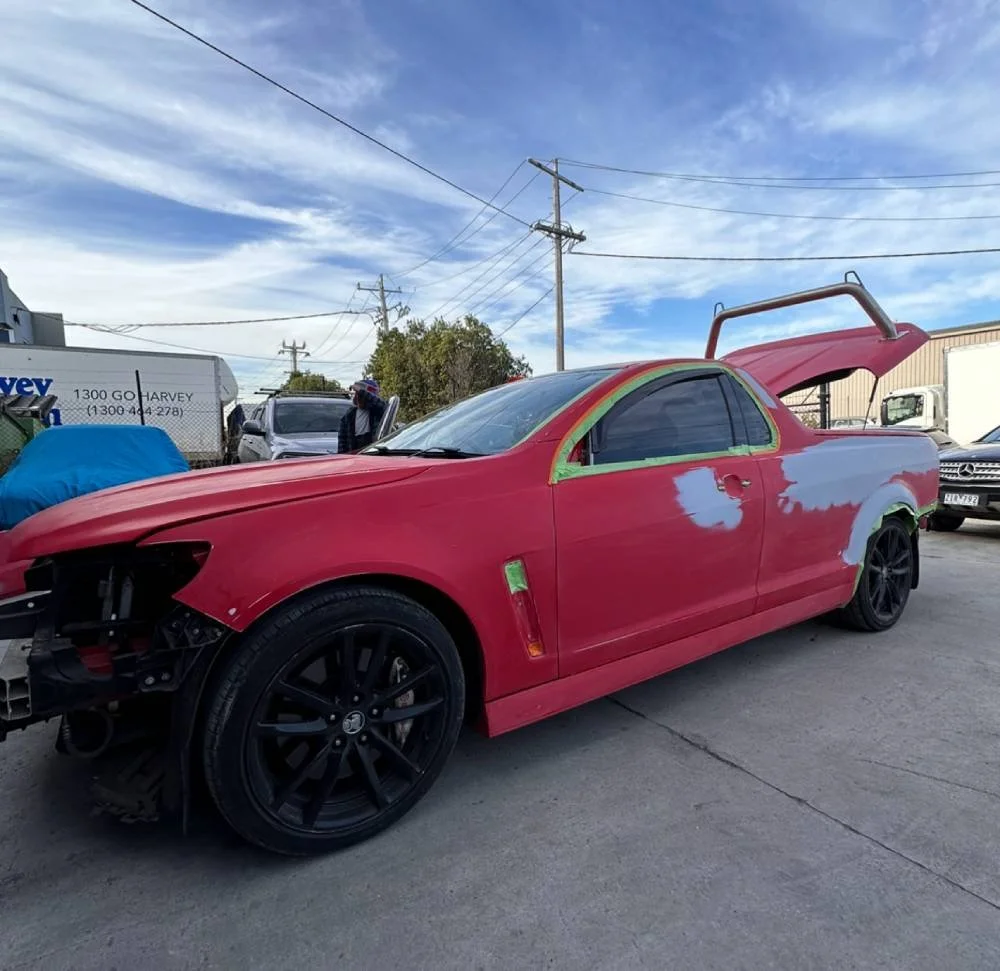 Car paint damage on red ute