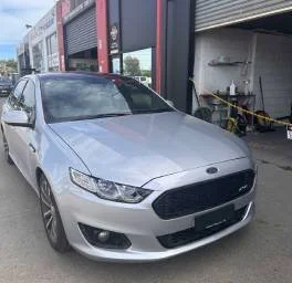 Car accident repairs on a silver car by Phantom Autobody