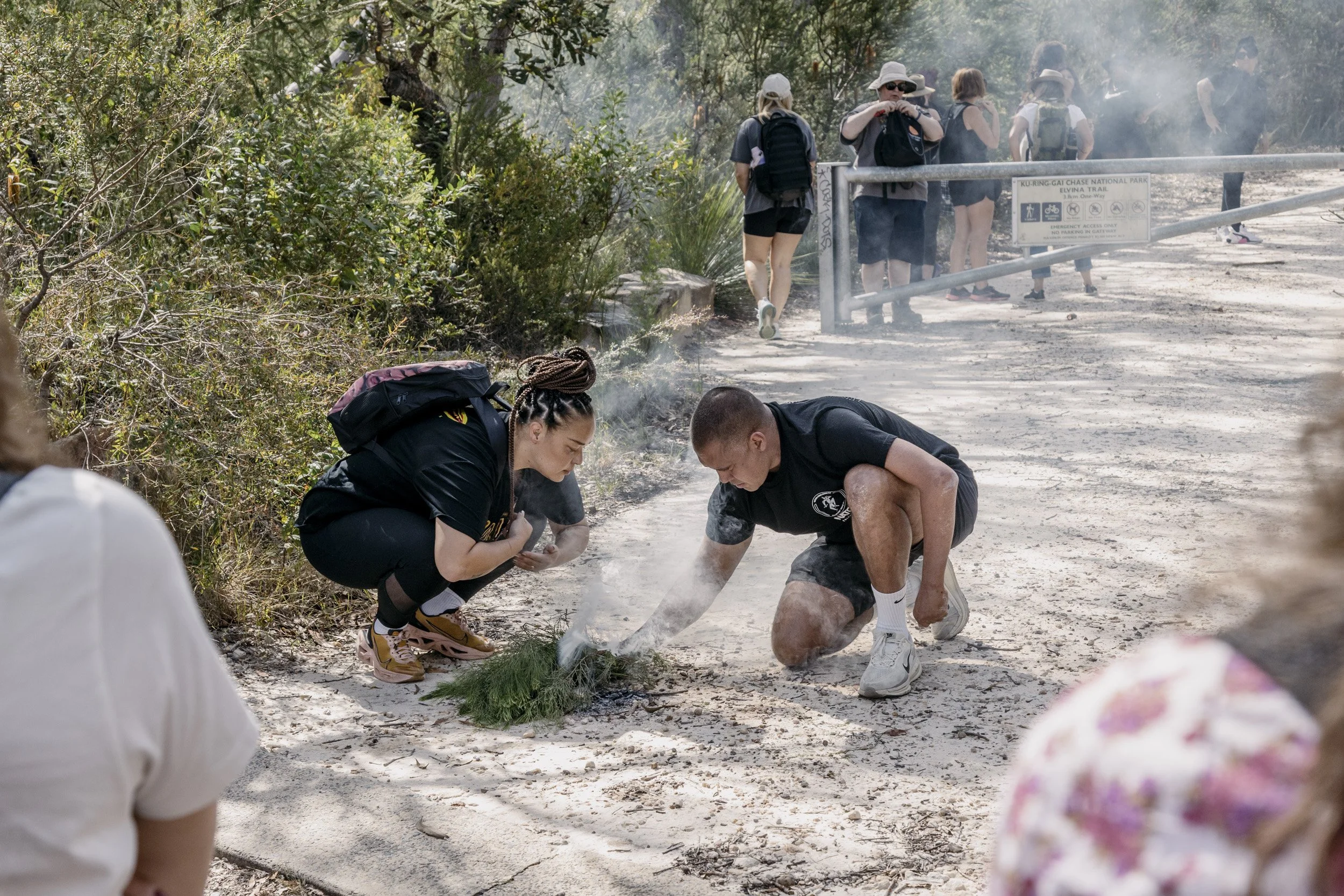 Eric Brown leading a smoking ceremony at the entrance of one of the trails in one of New South Wales' national parks.