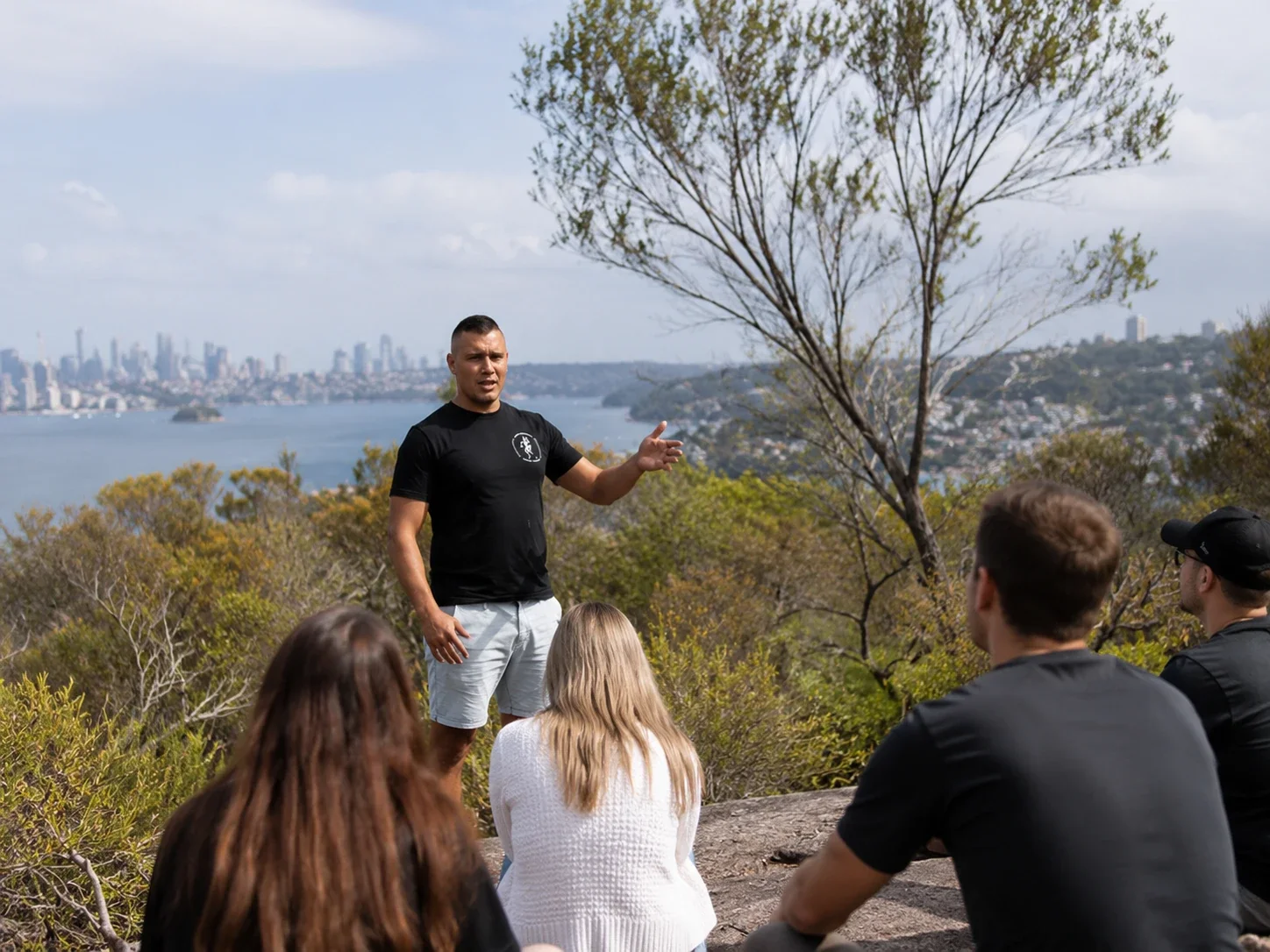 Natcha Cultural Tours guide leading visitors on Country in Sydney.