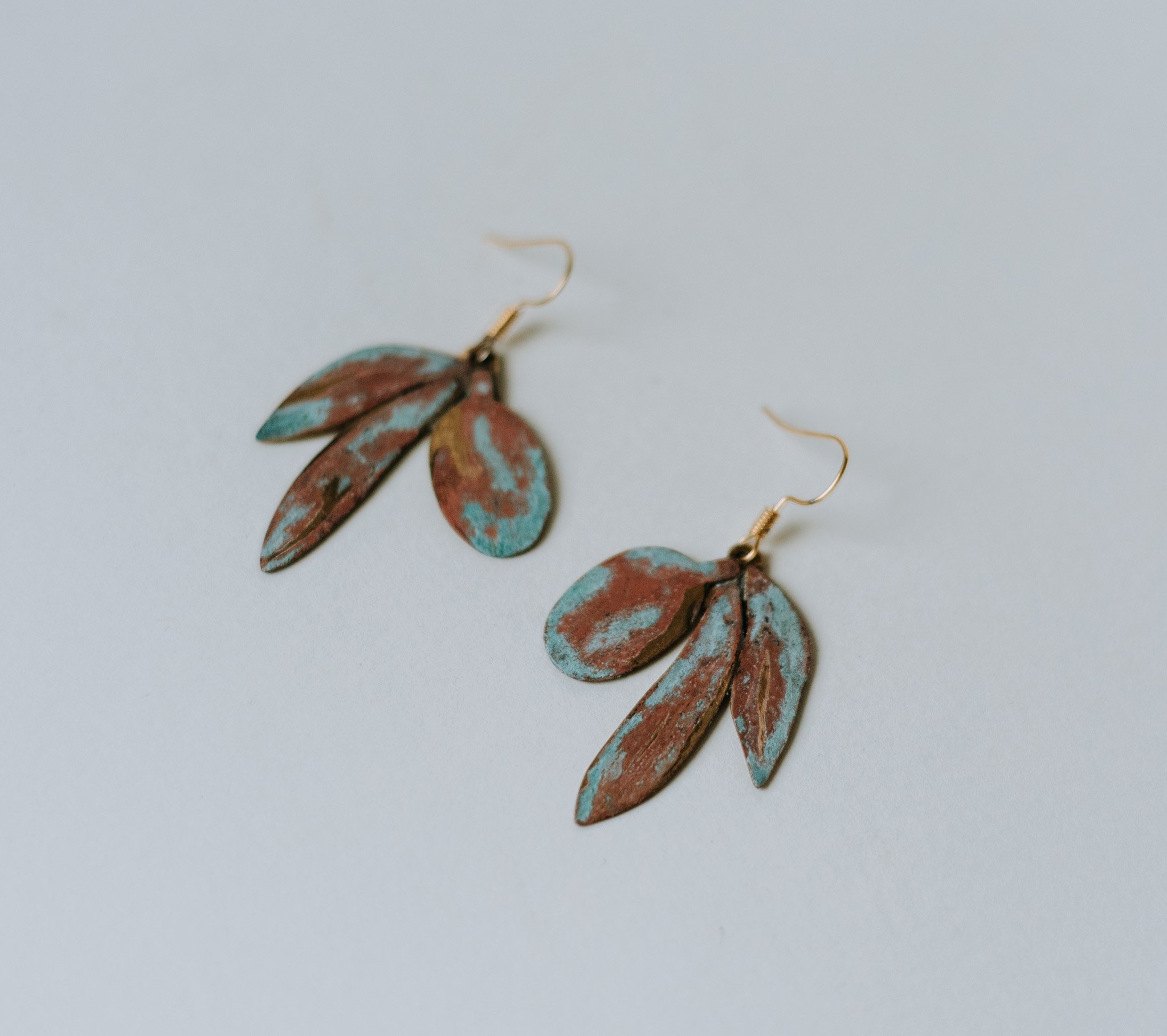 Patinated olive earrings inspired by long Summer evening under the olive trees. Wear a piece of the Mediterrnean in your ears.