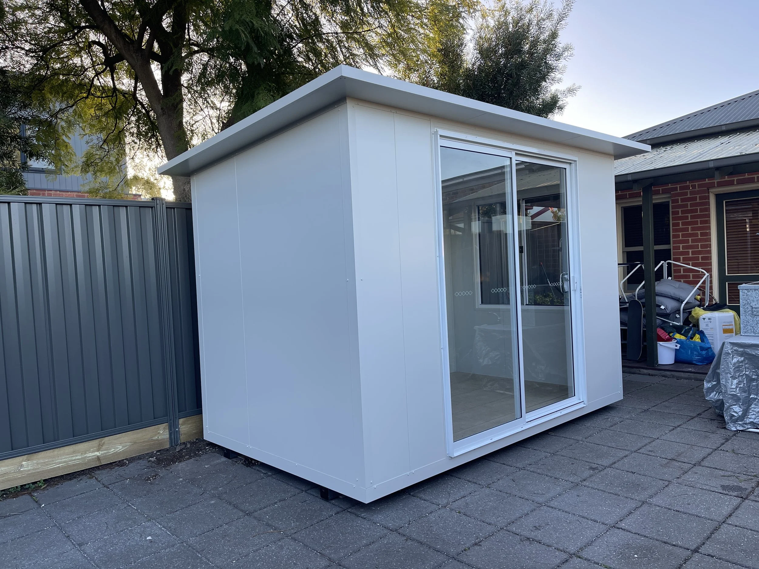 Custom Modular pod in Melbourne with sliding glass door and window, built on-site by Lifestyle Backyard Pods