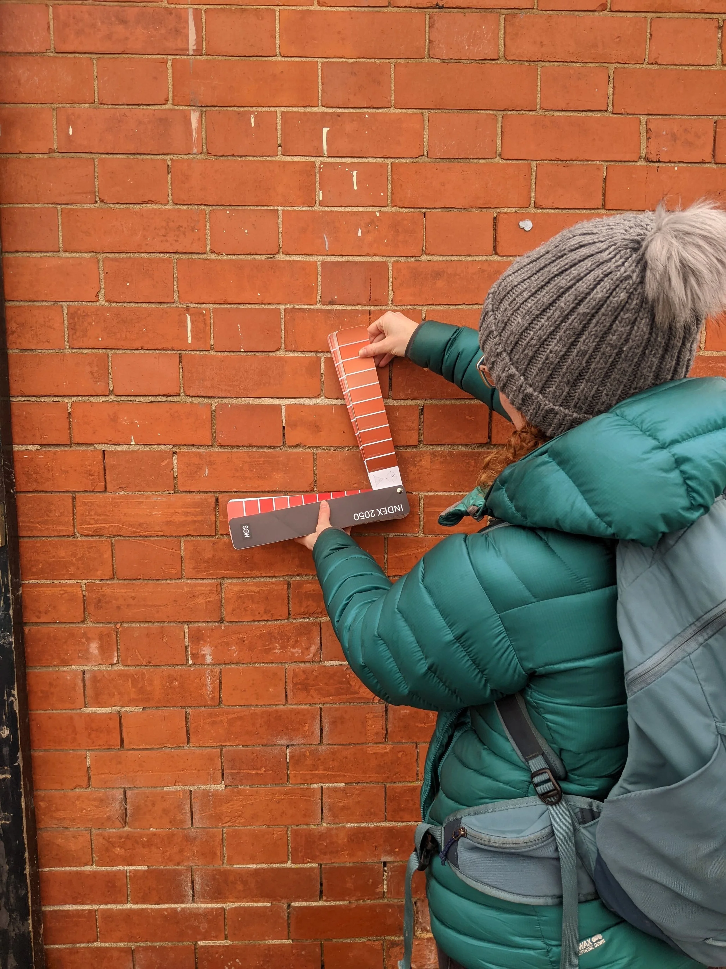 Collecting colour swatches during fieldwork.