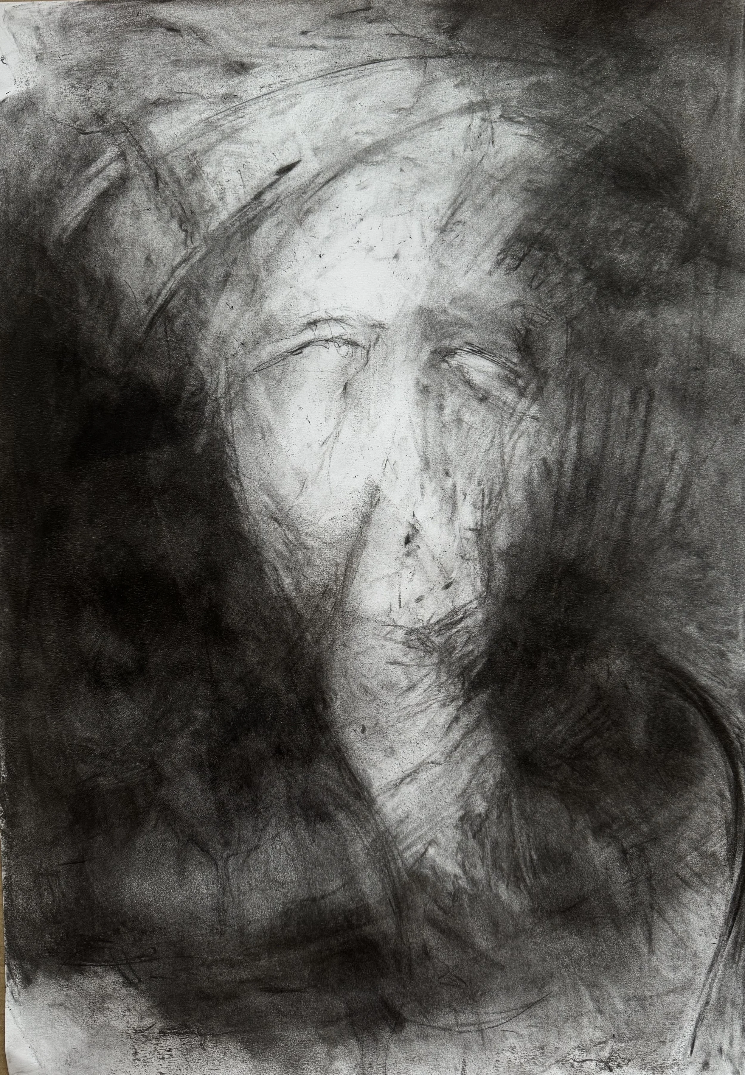 A charcoal sketch of a woman's face with a sorrowful expression, with eyes looking downward and slightly open lips.