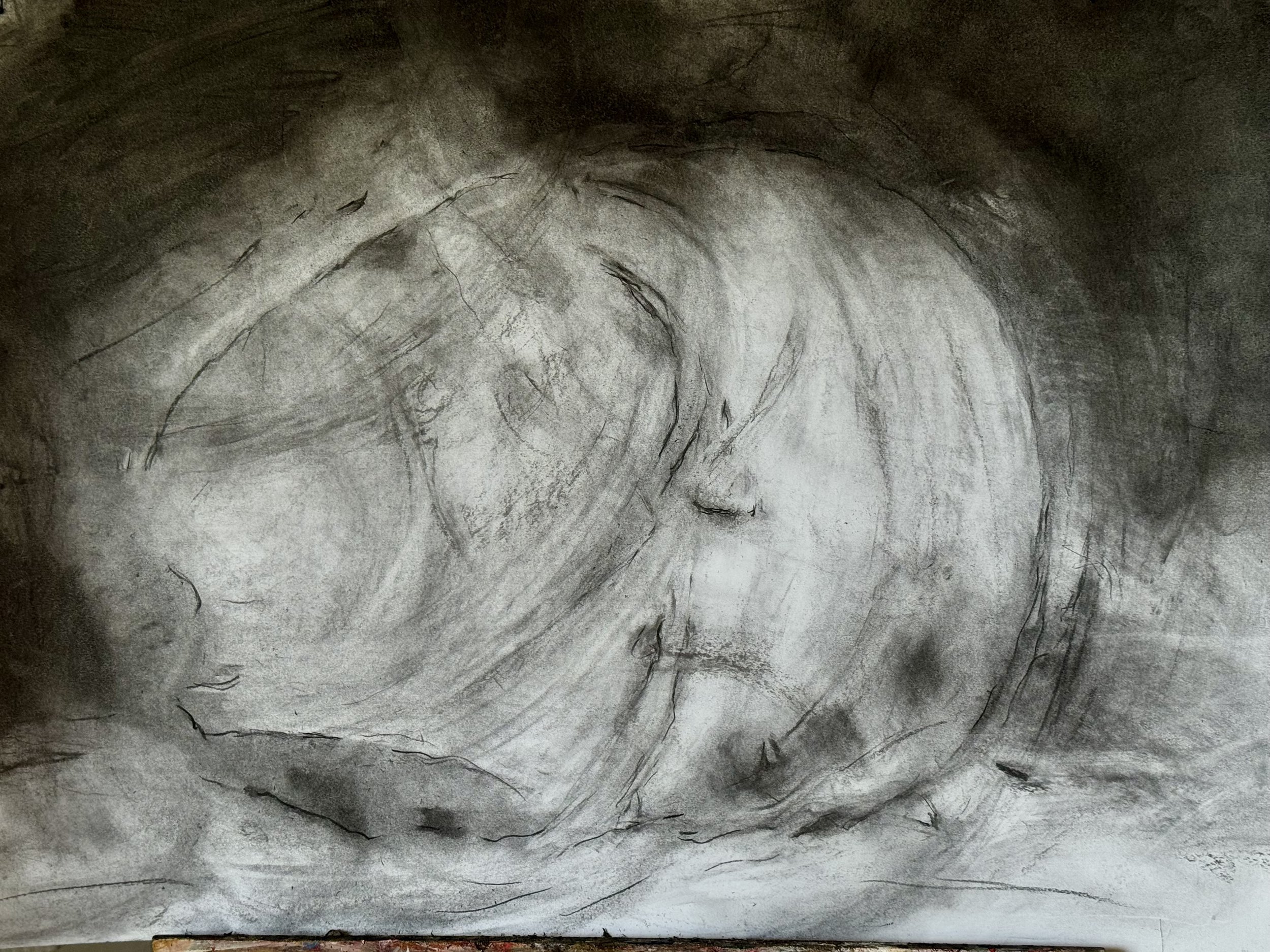 Black and white sketch of two faces, one with eyes closed and the other with eyes open, closely positioned.