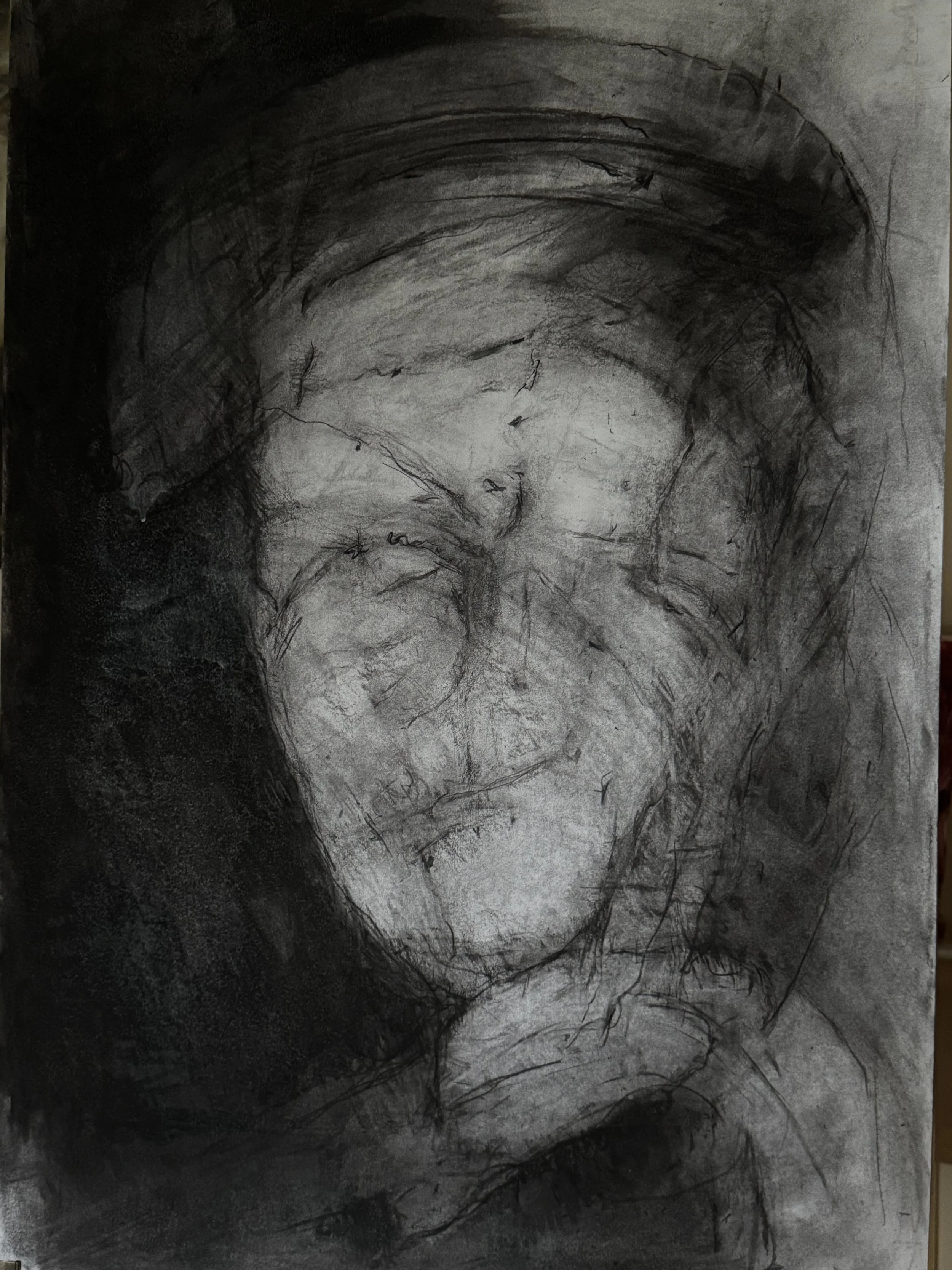 A monochrome sketch of a little girl with pigtails, closed eyes, and a thoughtful expression, resting her chin on her hand.