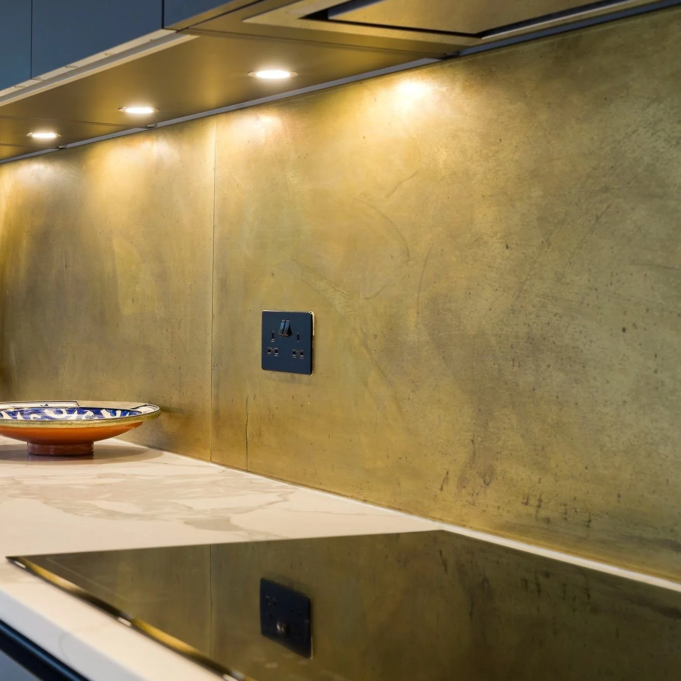 Brass backsplash