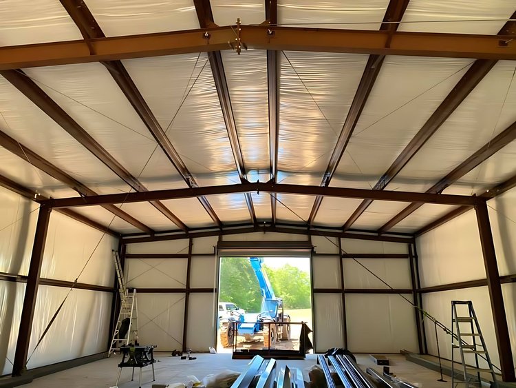 Insulated roof and walls inside a new steel building