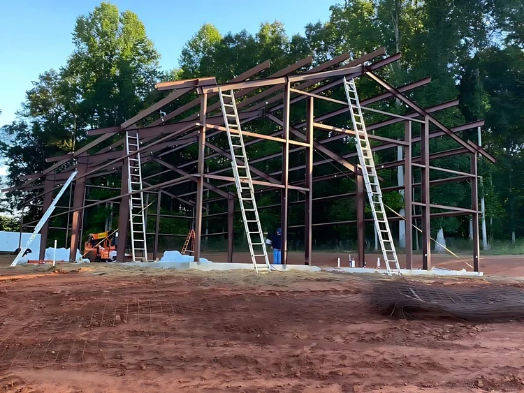 Steel frame going up on a new slab