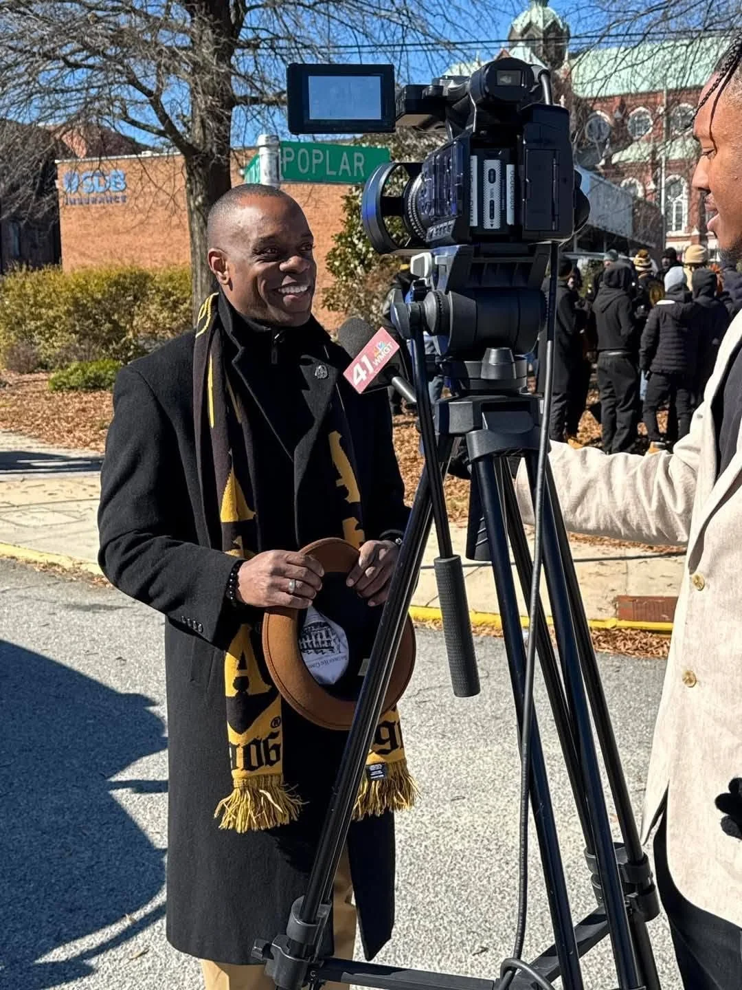 Talking with reporters at the MLK March