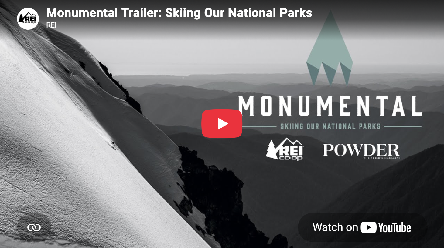 Black and white mountain landscape with snow-covered slopes, and a large text overlay that reads "Monumental: Skiing Our National Parks" with logos for REI Co-op and Powder magazine.